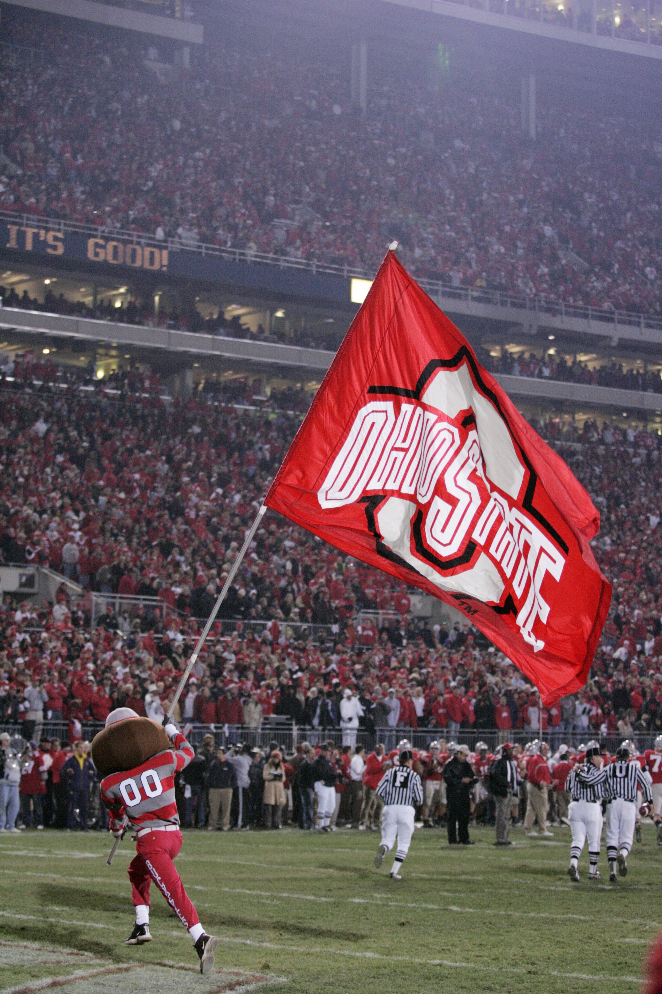 COLUMBUS, OH - NOVEMBER 18:  Ohio State Buckeyes mascot Brutus Buckeye waves a giant flag during the game against the Michigan Wolverines on November 18, 2006 at Ohio Stadium in Columbus, Ohio.  Ohio State won 42-39.  (Photo by Gregory Shamus/Getty Images