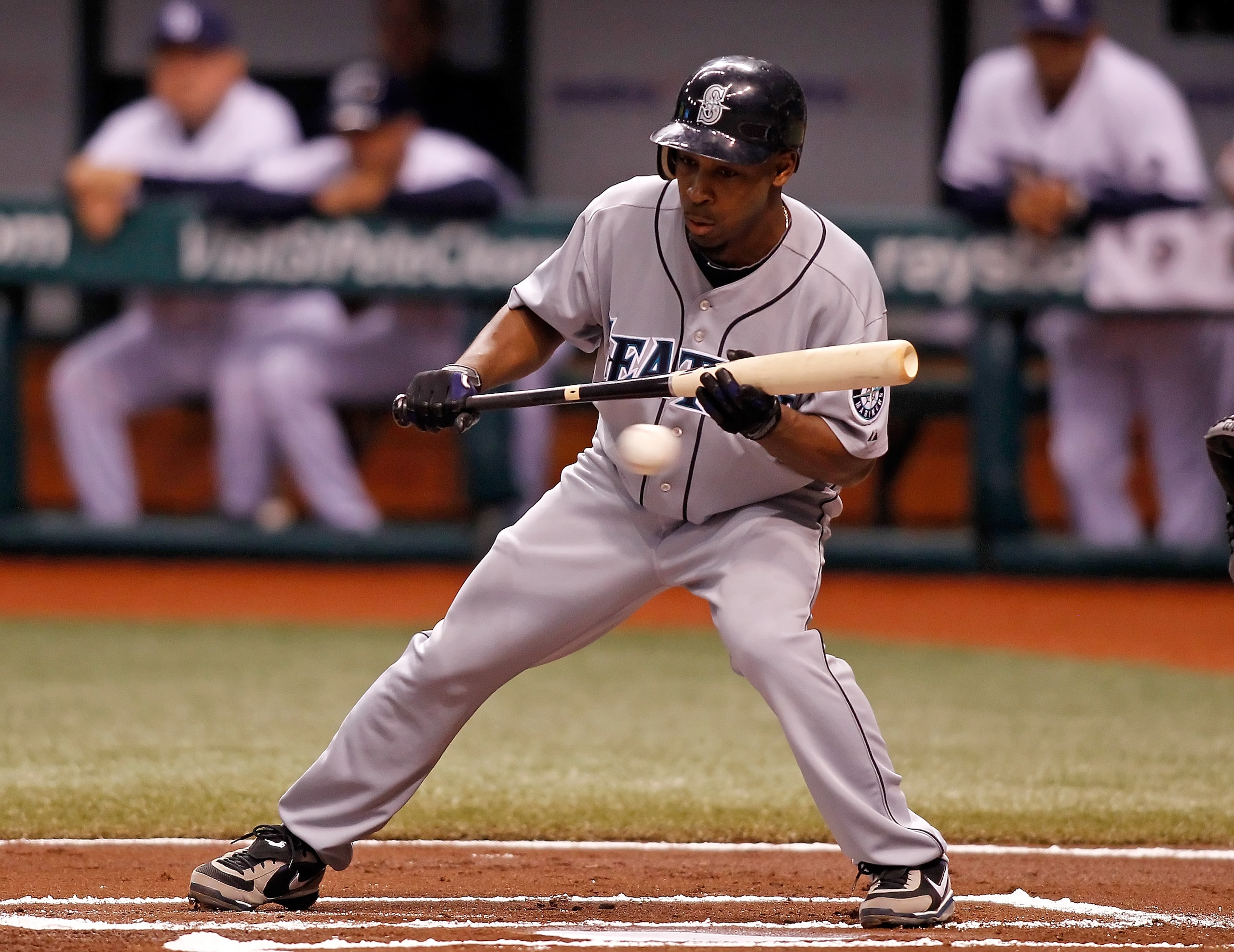 ST. PETERSBURG - SEPTEMBER 24: Infielder Chone Figgins #9 of the Seattle Mariners attempts a bunt against the Tampa Bay Rays during the game at Tropicana Field on September 24, 2010 in St. Petersburg, Florida. (Photo by J. Meric/Getty Images) ST. PETERSBURG - SEPTEMBER 24: Infielder Chone Figgins #9 of the Seattle Mariners attempts a bunt against the Tampa Bay Rays during the game at Tropicana Field on September 24, 2010 in St. Petersburg, Florida. (Photo by J. Meric/Getty Images)
