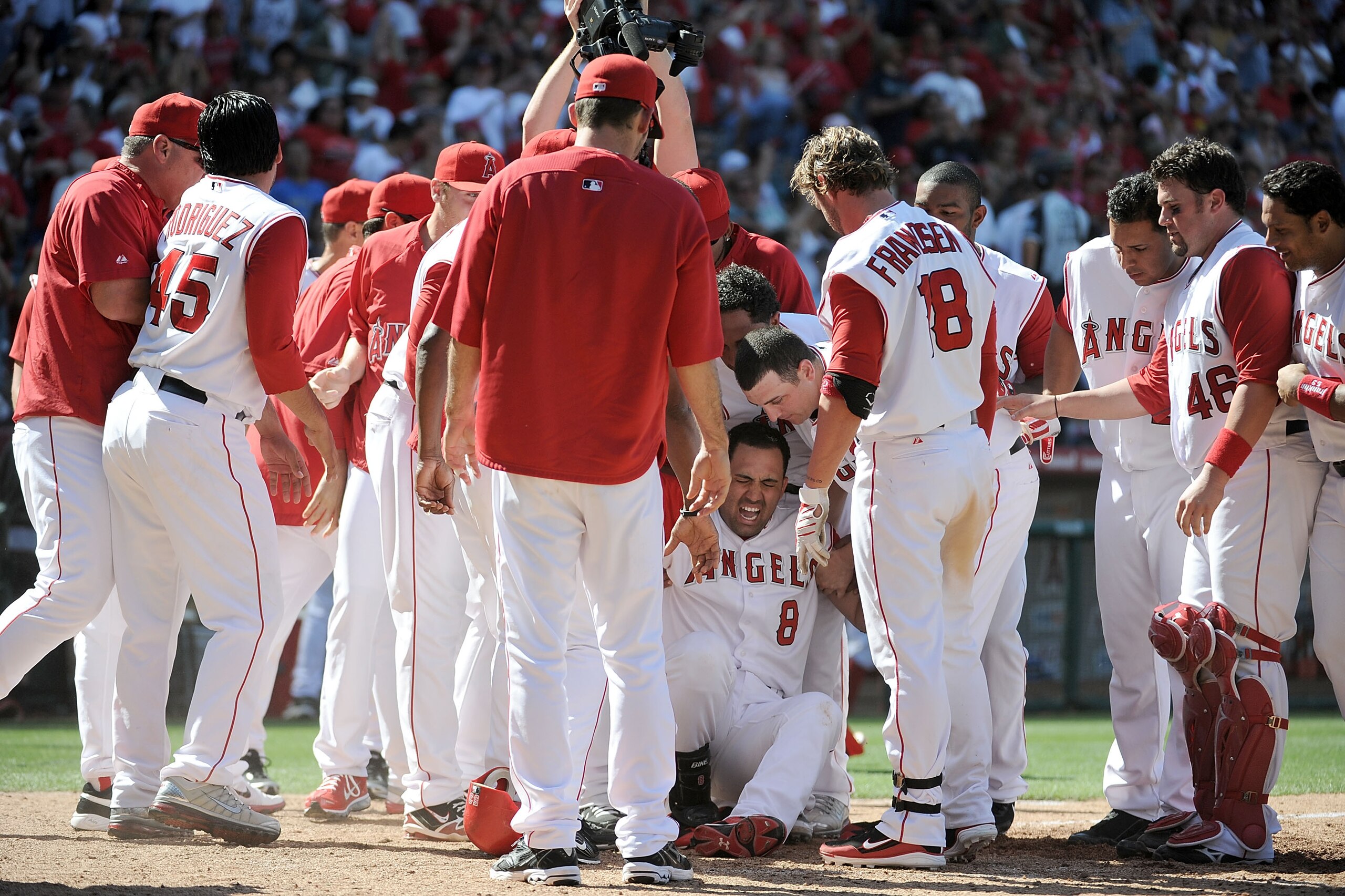 ANAHEIM, CA - MAY 29: Kendry Morales #8 of the Los Angeles Angels reacts to his injury on his way to home plate after his grand slam homerun to win the game 5-1 over the Seattle Mariners during the bottom of the ninth inning at Angel Stadium on May 29, 2 ANAHEIM, CA - MAY 29: Kendry Morales #8 of the Los Angeles Angels reacts to his injury on his way to home plate after his grand slam homerun to win the game 5-1 over the Seattle Mariners during the bottom of the ninth inning at Angel Stadium on May 29, 2