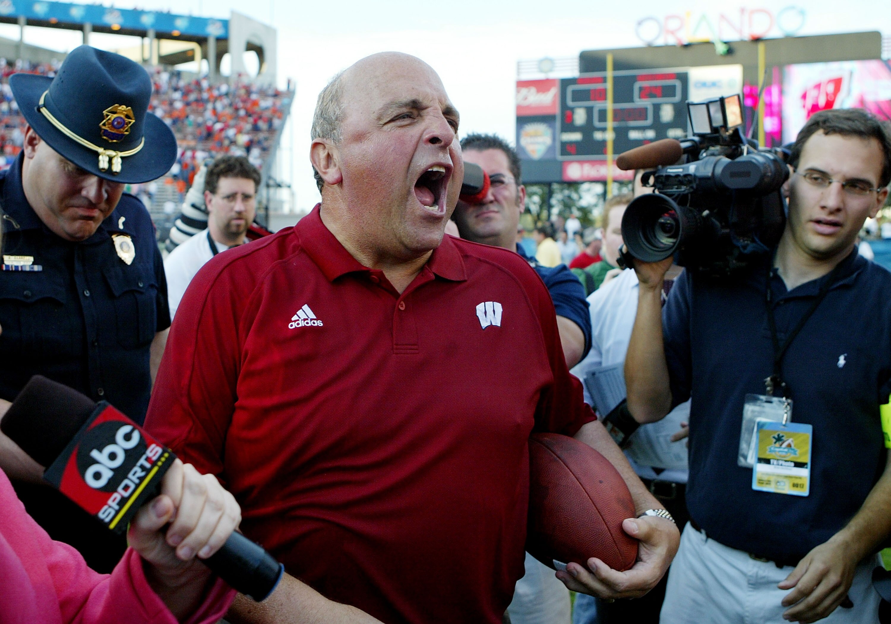 ORLANDO, FL - JANUARY 2:  Head coach Barry Alvarez of the Wisconsin Badgers yells out to the media after defeating the Auburn Tigers in the Capital One Bowl at the Florida Citrus Bowl on January 2, 2006 in Orlando, Florida. Wisconsin defeated Auburn 24-10