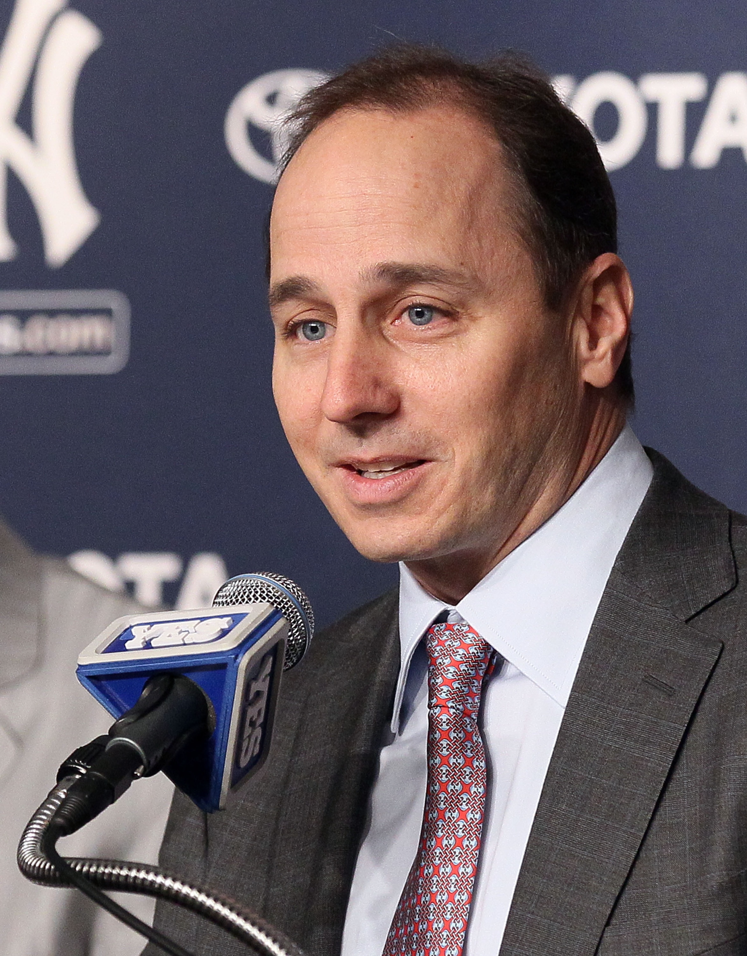 NEW YORK, NY - JANUARY 19:  General manager Brian Cashman of the New York Yankees speaks during a press conference introducing Rafael Soriano (not pictured) on January 19, 2011 at Yankee Stadium in the Bronx borough of New York City. The Yankees signed So