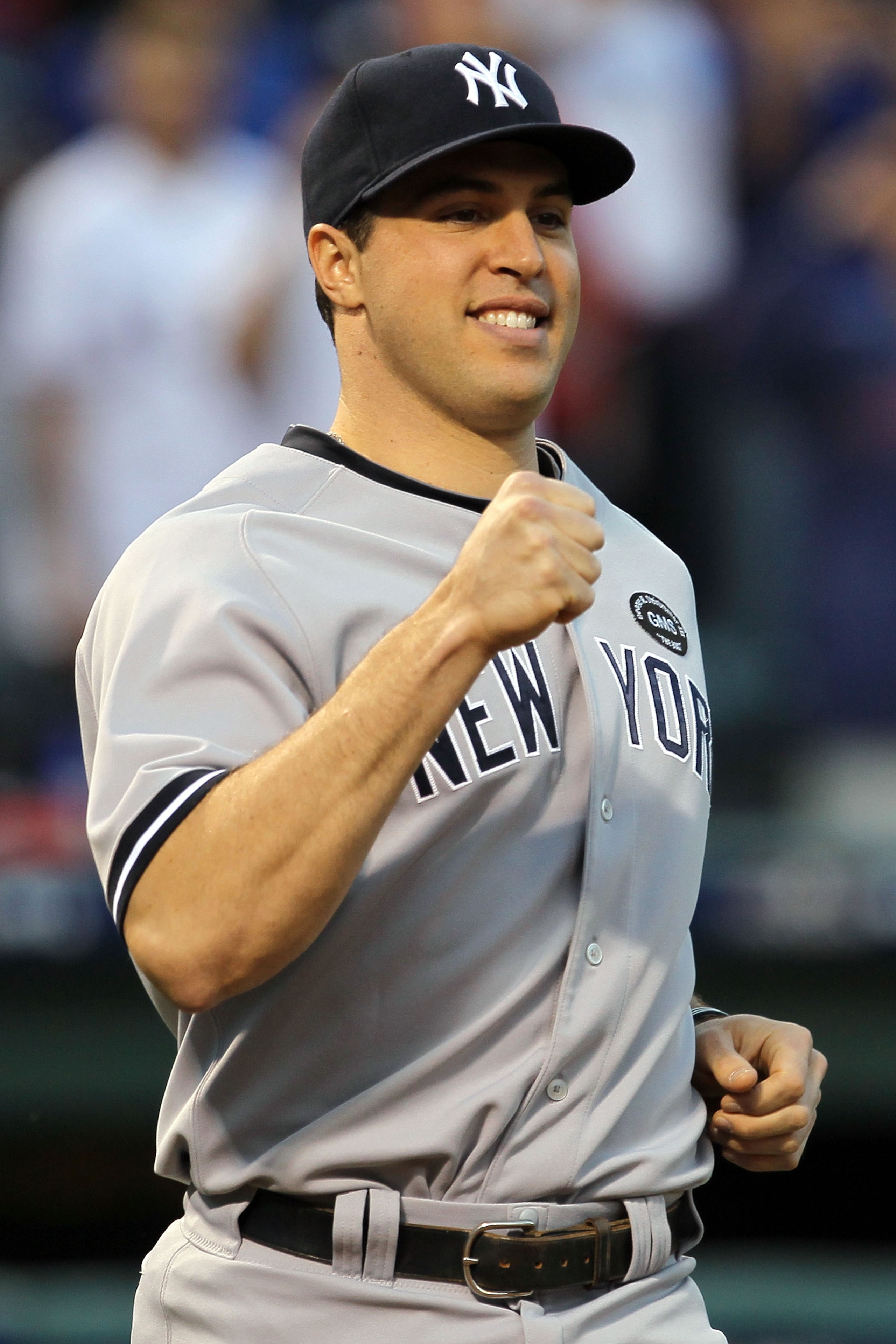 ARLINGTON, TX - OCTOBER 15:  Mark Teixeira #25 of the New York Yankees smiles during player introductions against the Texas Rangers in Game One of the ALCS during the 2010 MLB Playoffs at Rangers Ballpark in Arlington on October 15, 2010 in Arlington, Tex