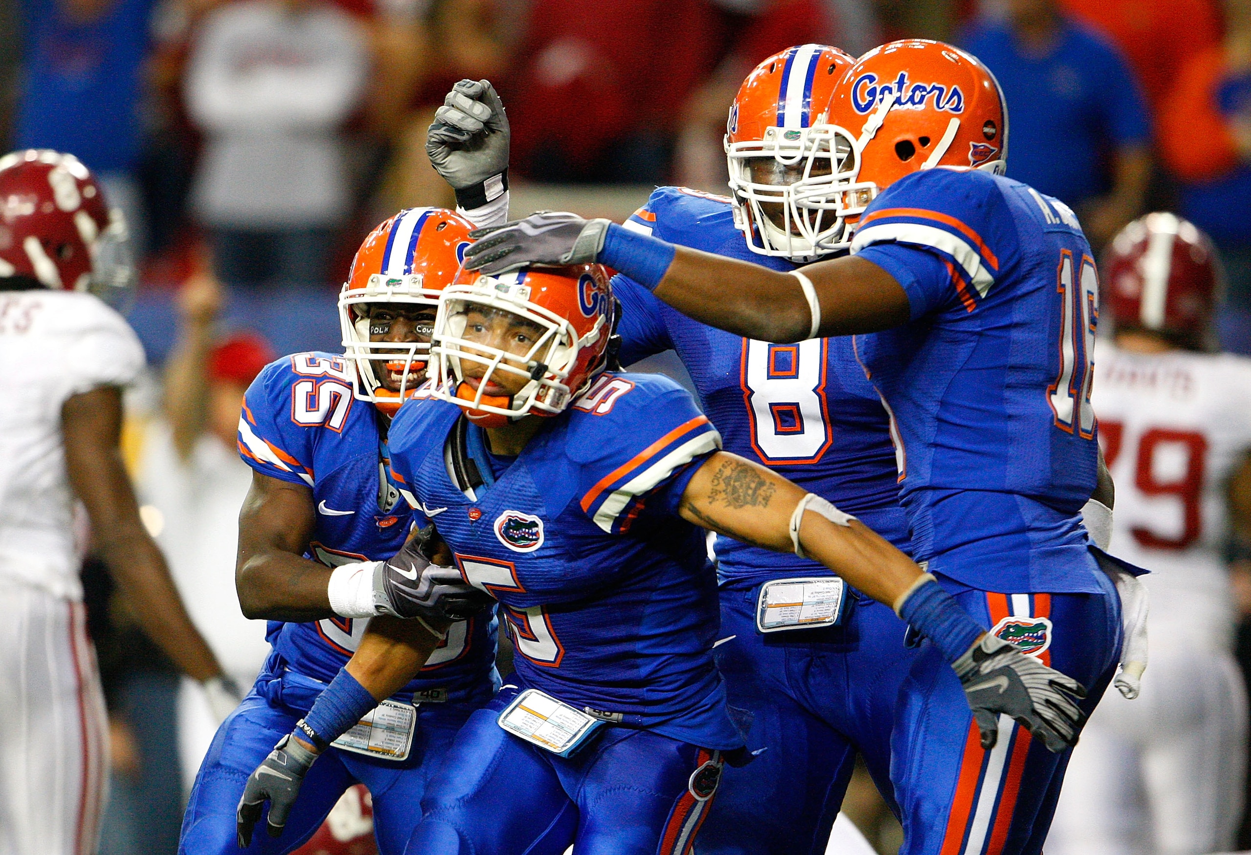 ATLANTA - DECEMBER 06:  Joe Hadan #5 of the Florida Gators celebrates with teammates after intercepting a pass in the final minutes of their 31-20 win over the Alabama Crimson Tide during the SEC Championship on December 6, 2008 at the Georgia Dome in Atl