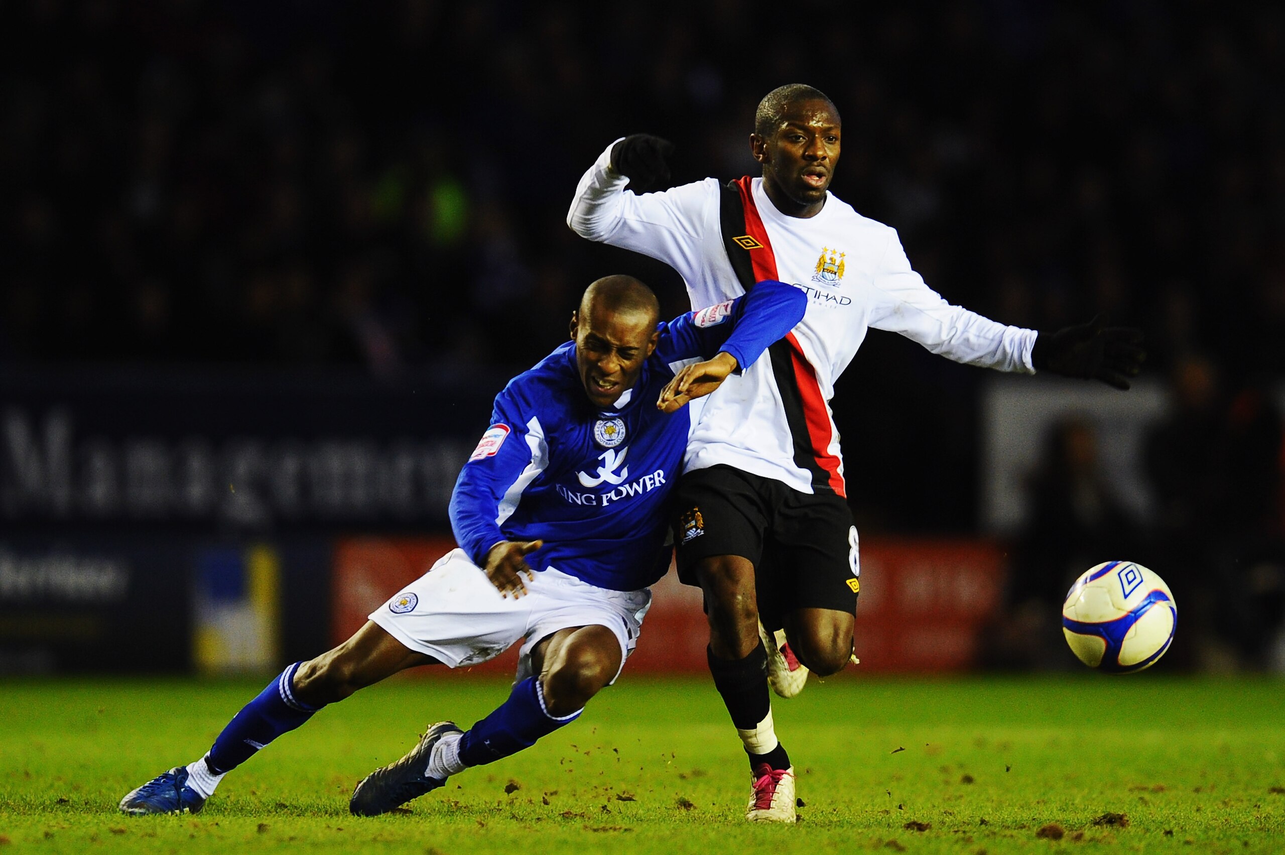 LEICESTER, UNITED KINGDOM - JANUARY 09: Lloyd Dyer (L) of Leicester City challenges Shaun Wright-Phillips (R) of Manchester City during the FA Cup sponsored by E.ON 3rd Round match between between Leicester City and Manchester City at Walkers Stadium on LEICESTER, UNITED KINGDOM - JANUARY 09: Lloyd Dyer (L) of Leicester City challenges Shaun Wright-Phillips (R) of Manchester City during the FA Cup sponsored by E.ON 3rd Round match between between Leicester City and Manchester City at Walkers Stadium on