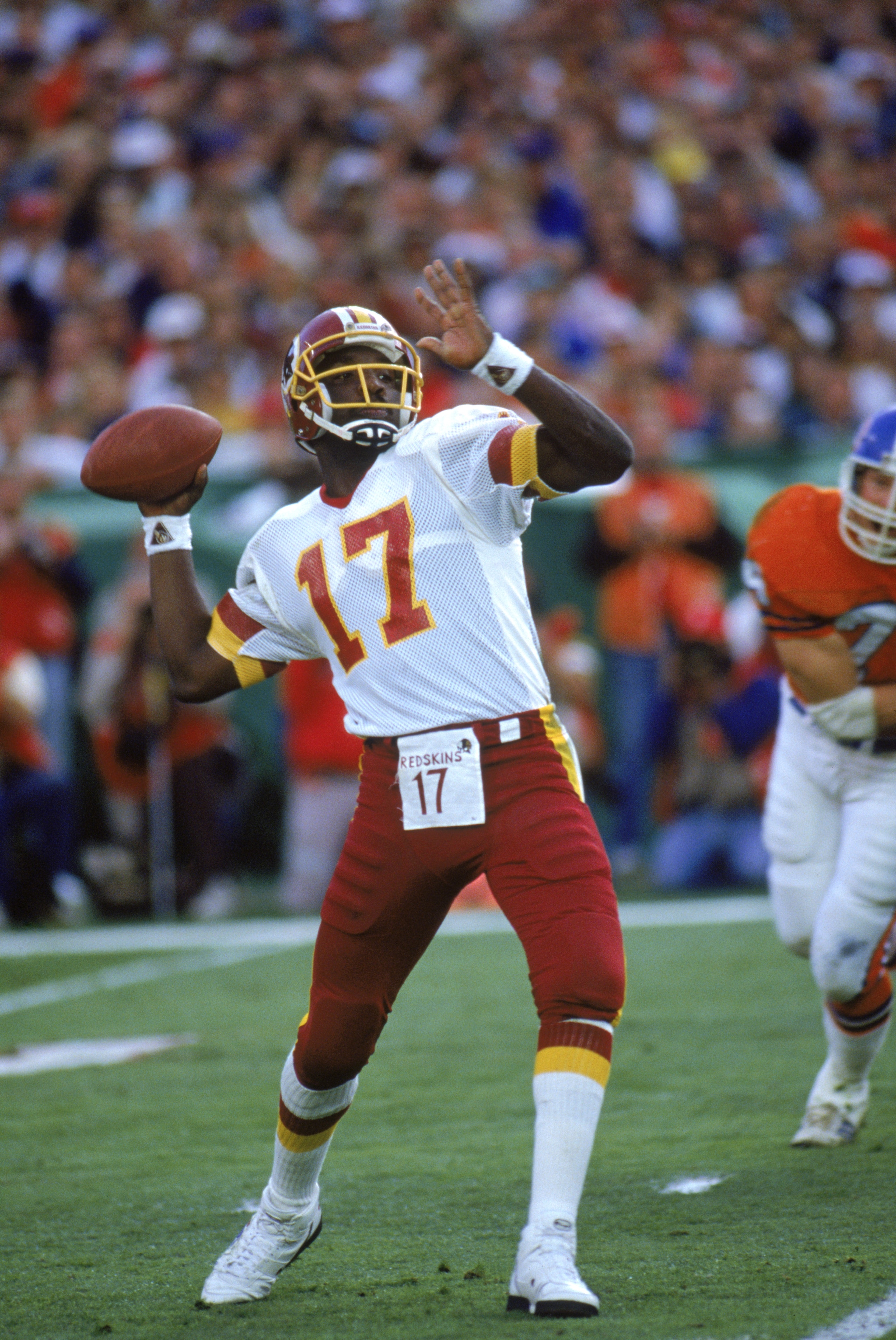 SAN DIEGO - JANUARY 31:  Quarterback Doug Williams #17 of the Washington Redskins looks to pass during Super Bowl XXII against the Denver Broncos at Jack Murphy Stadium on January 31, 1988 in San Diego, California.  The Redskins won 42-10.  (Photo by Bud