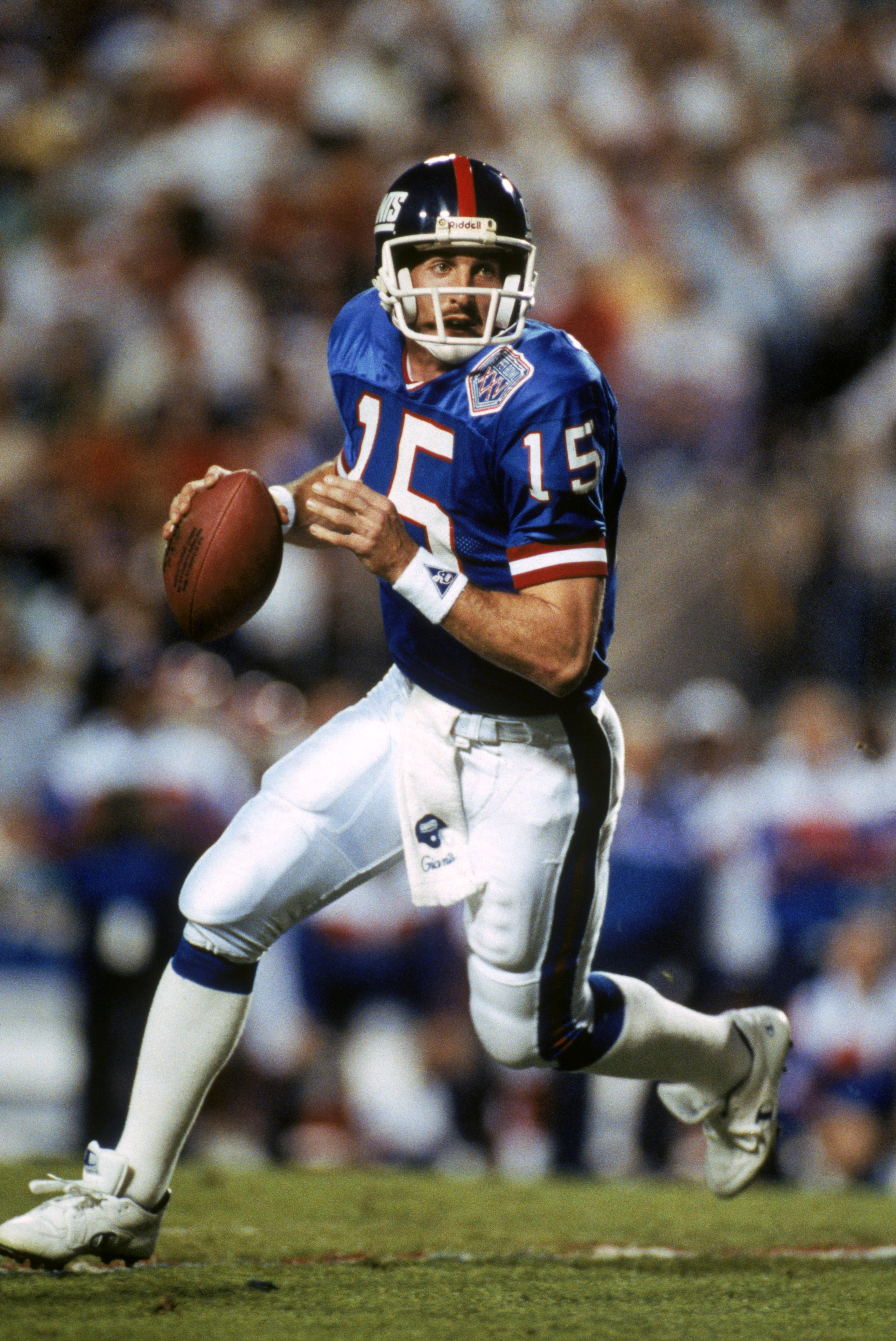 TAMPA, FL - JANUARY 27:  Quarterback Jeff Hostetler #15 of the New York Giants rolls out against the Buffalo Bills during Super Bowl XXV at Tampa Stadium on January 27, 1991 in Tampa, Florida. The Giants defeated the Bills 20-19.  (Photo by George Rose/Ge