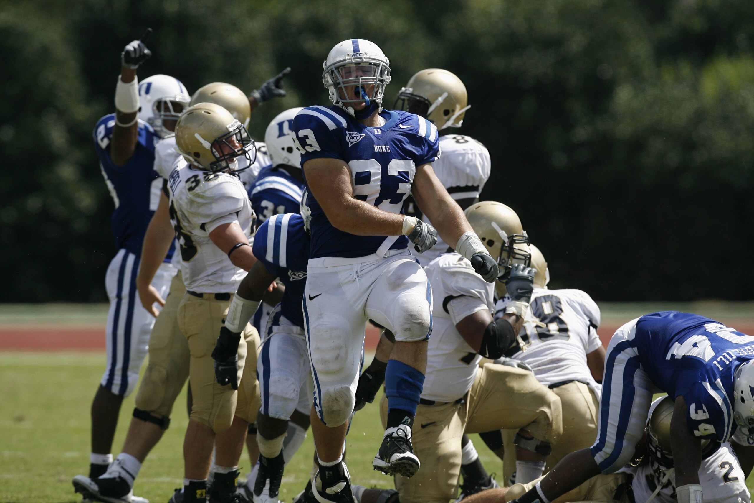 DURHAM, NC - SEPTEMBER 13:  Charlie Hatcher #93 of the Duke Blue Devils celebrates against the Navy Midshipmen during the game at Wallace Wade Stadium on September 13, 2008 in Durham, North Carolina.  (Photo by Kevin C. Cox/Getty Images)