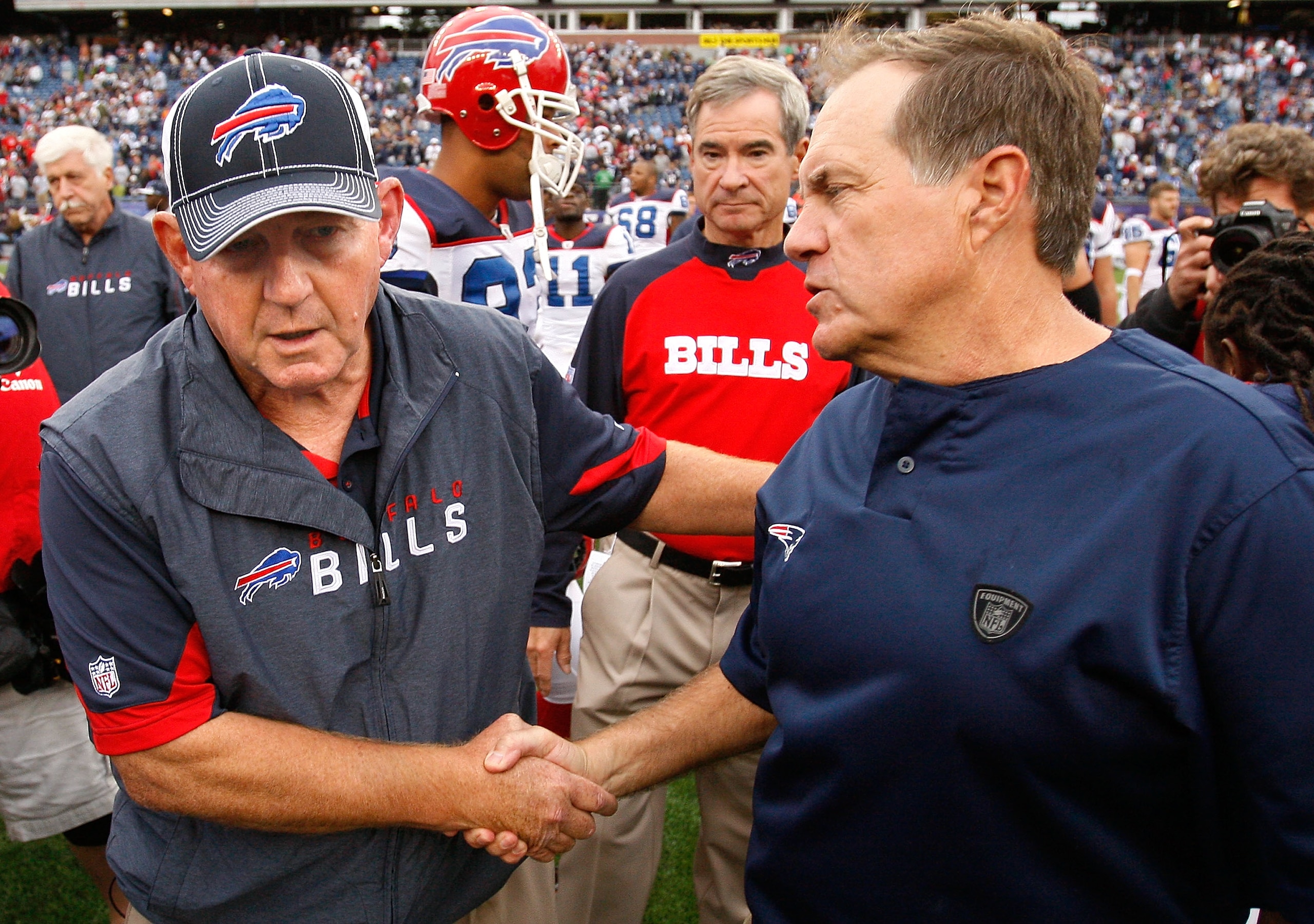 FOXBORO, MA - SEPTEMBER 26:  Coach Bill Belichick of the New England Patriots (R) shakes hands with coach Chan Gailey of the Buffalo Bills after the game at Gillette Stadium on September 26, 2010 in Foxboro, Massachusetts. The Patriots won 38-30. (Photo b