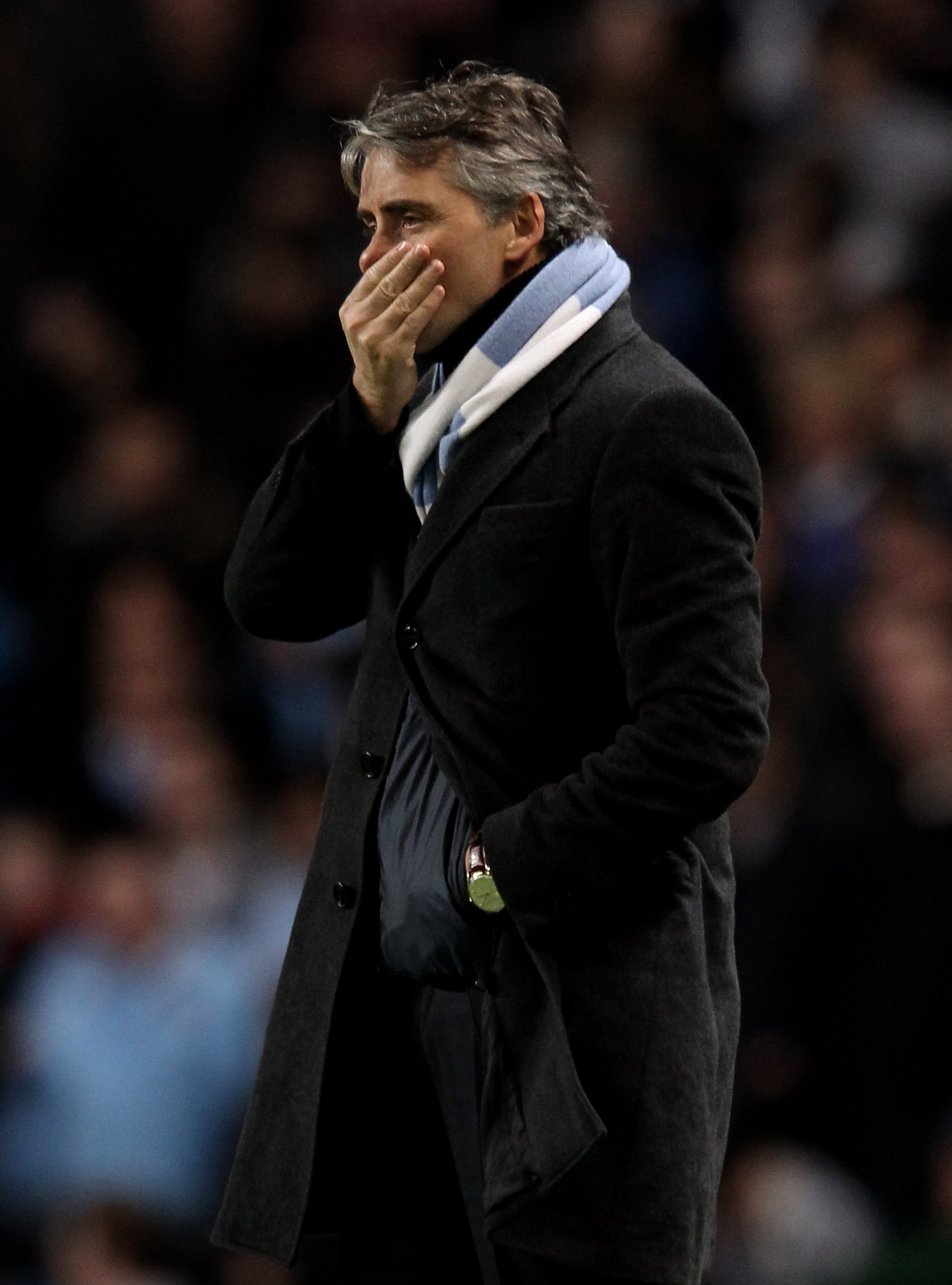 MANCHESTER, ENGLAND - JANUARY 15:  Manchester City Manager Roberto Mancini looks on during the Barclays Premier League match between Manchester City and Wolverhampton Wanderers at the City of Manchester Stadium on January 15, 2011 in Manchester, England. 