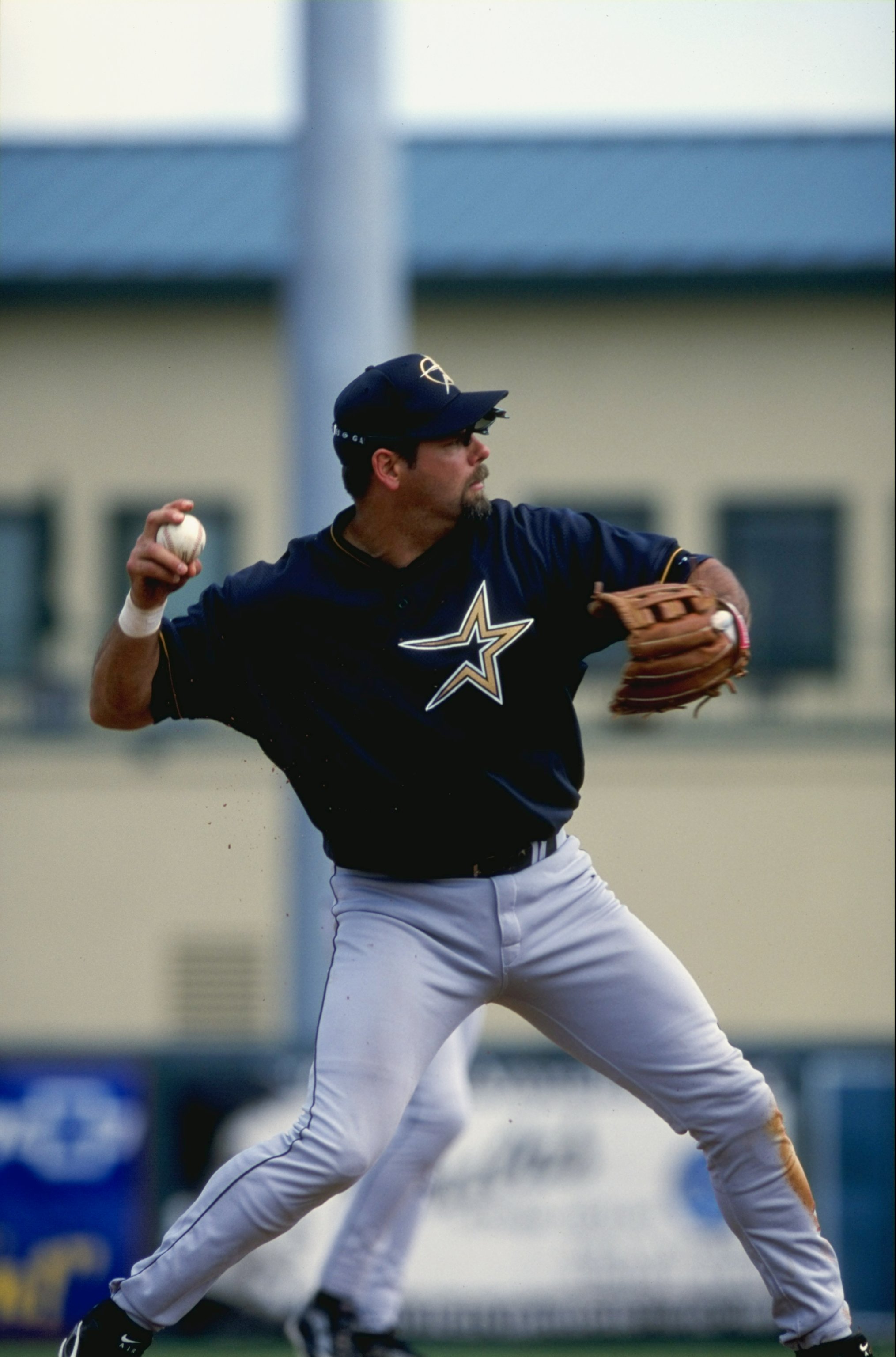 8 Mar 1999: Infielder Ken Caminiti #11 of the Houston Astros throws the ball during the Spring Training game against the St. Louis Cardinals at the Roger Dean Stadium in Jupiter, Florida. The Astros defeated the Cardinals 2-1. Mandatory Credit: David Leed