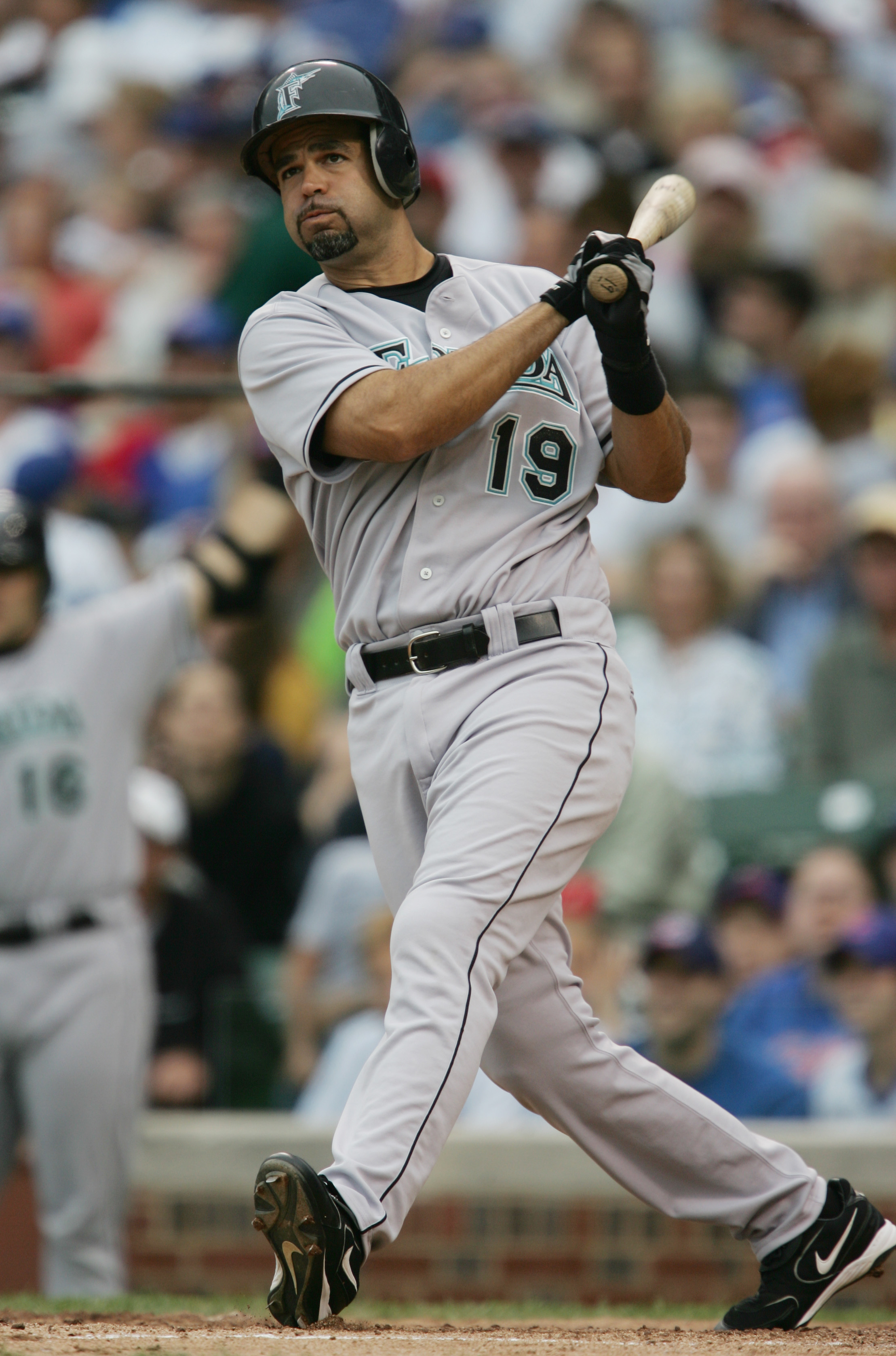 CHICAGO - JUNE 15:  Mike Lowell #19 of the Florida Marlins at bat against the Chicago Cubs on June 15, 2005 at Wrigley Field in Chicago, Illinois. The Marlins defeated the Cubs 15-5. (Photo by Jonathan Daniel/Getty Images)