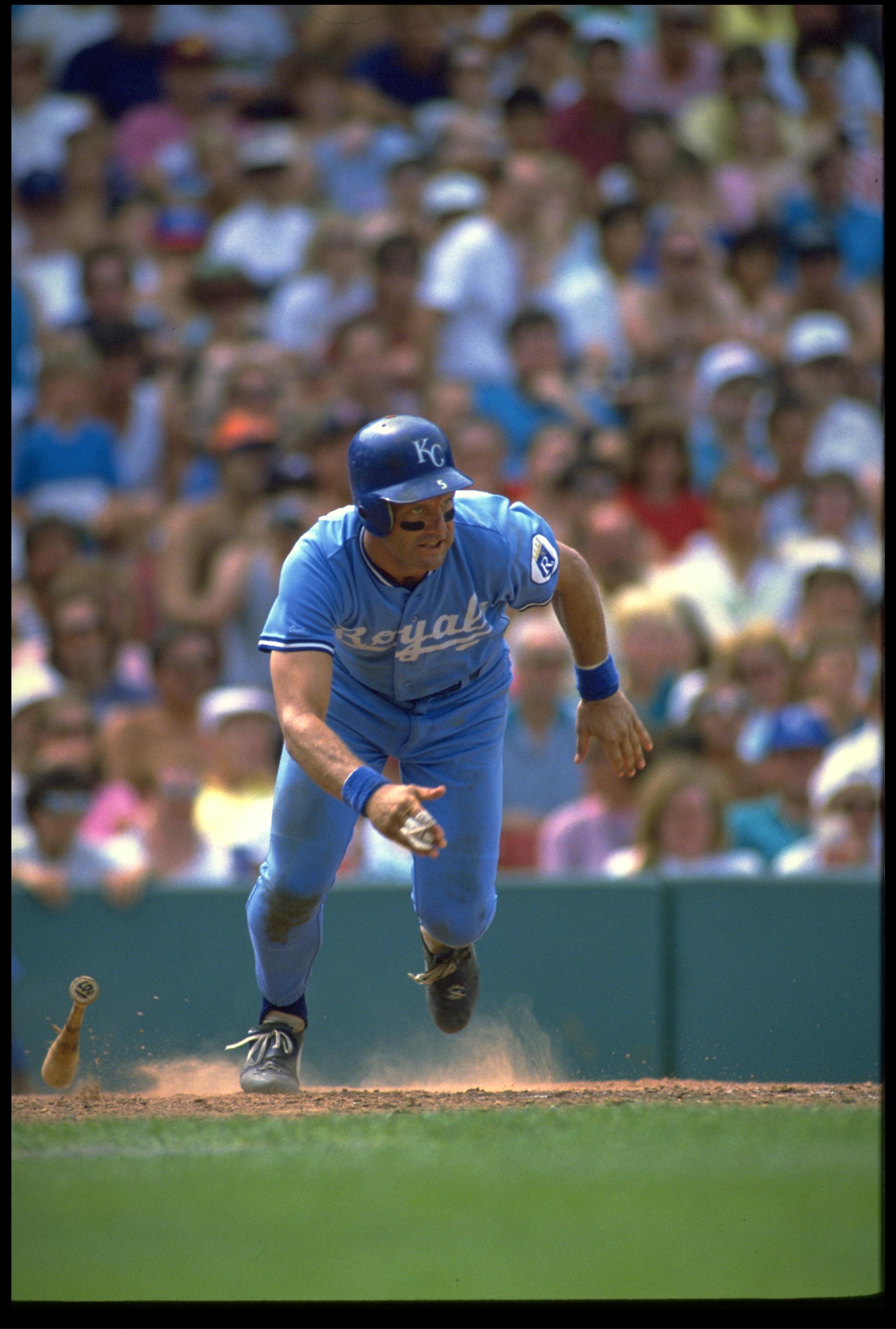 1990:  KANSAS CITY ROYALS INFIELDER GEORGE BRETT RUNS TO FIRST BASE AFTER MAKING CONTACT WITH A PITCH DURING THE ROYALS GAME AT ROYALS STADIUM IN KANSAS CITY, MISSOURI.