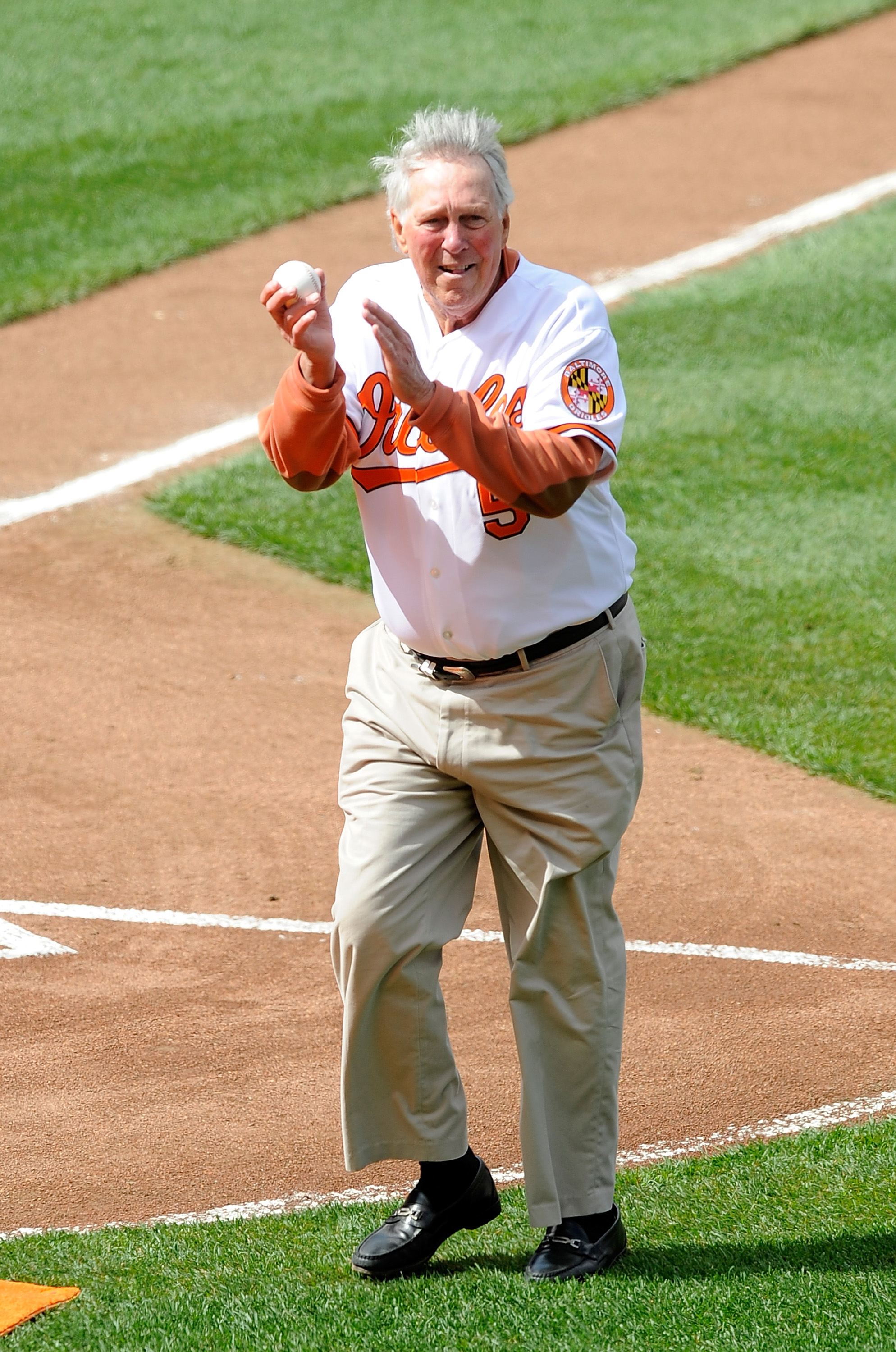 BALTIMORE - APRIL 09:  Brooks Robinson waves to the crowd after throwing out the first pitch before the game between the Baltimore Orioles and the Toronto Blue Jays on Opening Day at Camden Yards on April 9, 2010 in Baltimore, Maryland.  (Photo by Greg Fi