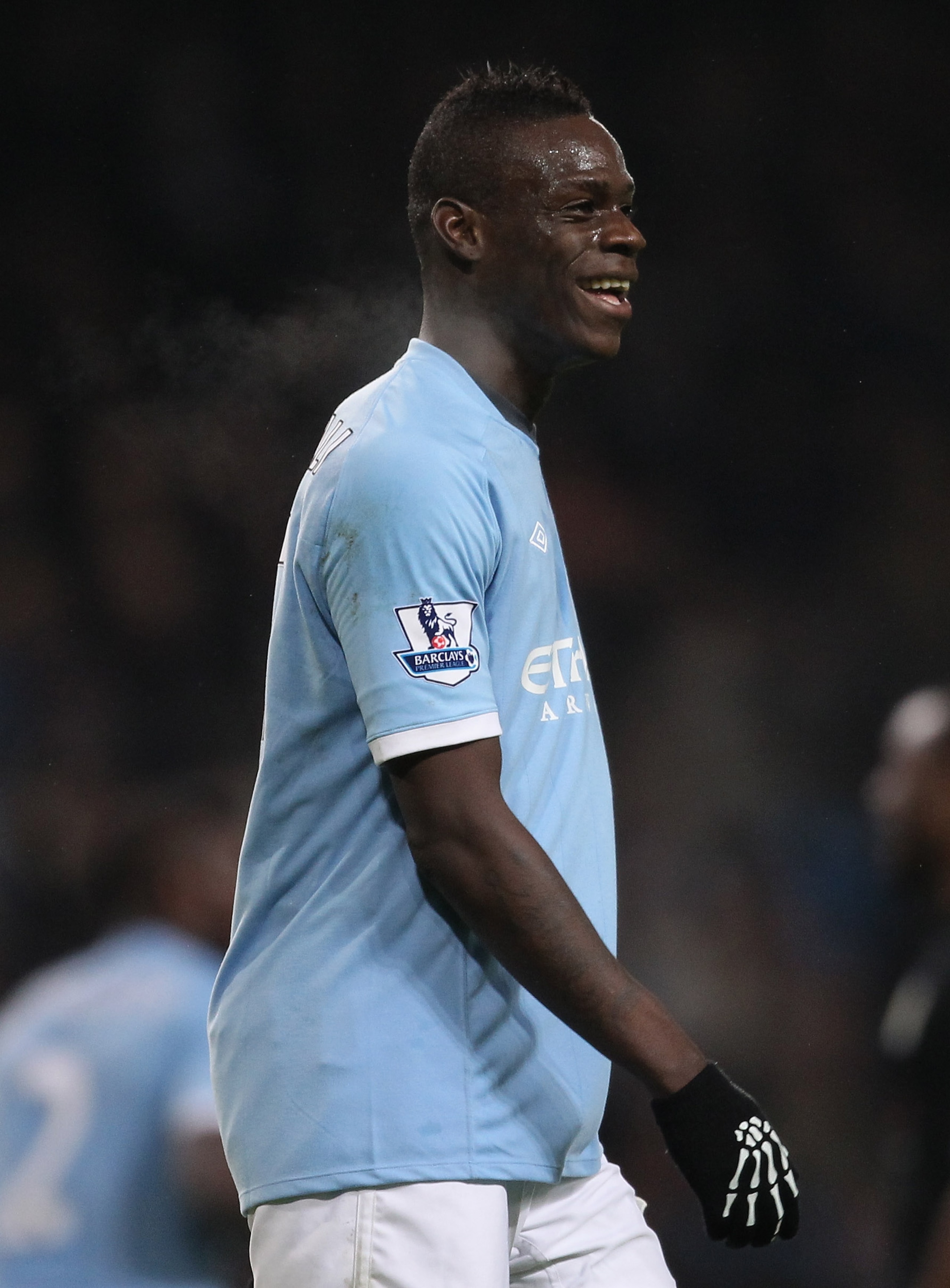 MANCHESTER, ENGLAND - DECEMBER 28:  Mario Balotelli of Manchester City smiles after scoring his third goal during the Barclays Premier League match between Manchester City and Aston Villa at the City of Manchester Stadium on December 28, 2010 in Mancheste