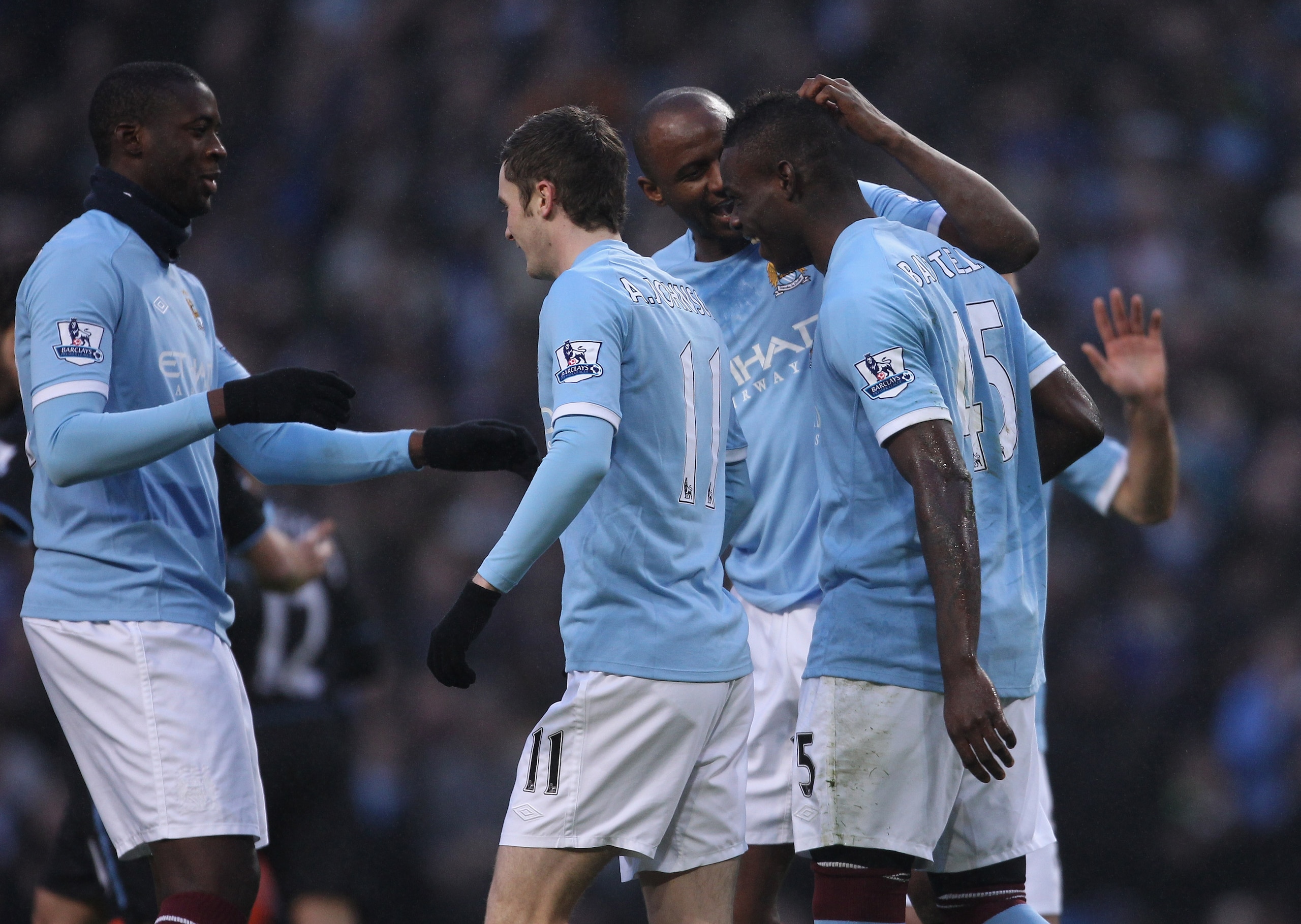 MANCHESTER, ENGLAND - DECEMBER 28:  Mario Balotelli of Manchester City celebrates with Patrick Viera after scoring his first goal during the Barclays Premier League match between Manchester City and Aston Villa at the City of Manchester Stadium on Decembe