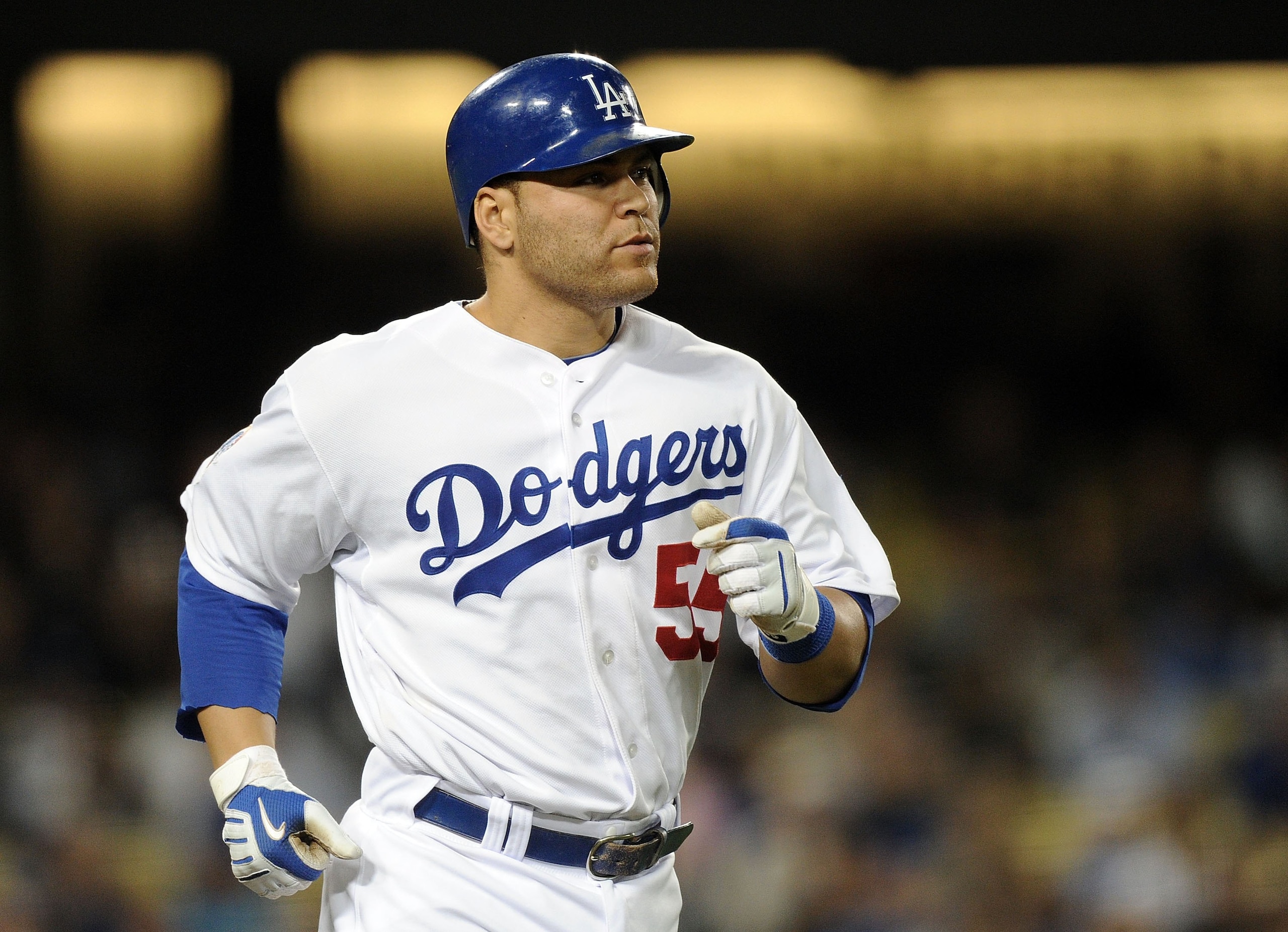LOS ANGELES, CA - MAY 20:  Russell Martin #55 of the Los Angeles Dodgers makes his way to first base against the San Diego Padres at Dodger Stadium on May 20, 2010 in Los Angeles, California.  (Photo by Harry How/Getty Images)