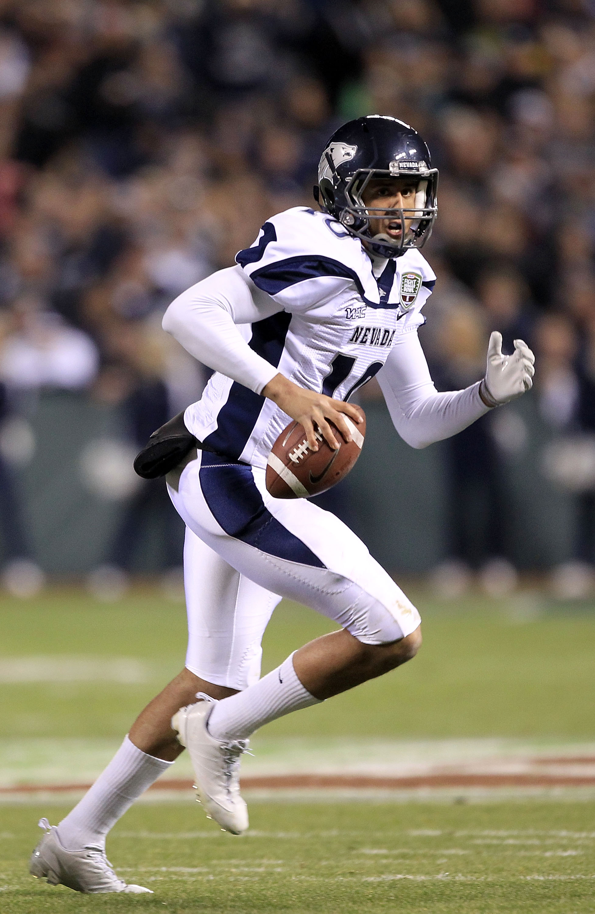 SAN FRANCISCO, CA - JANUARY 09:  Colin Kaepernick #10 of the Nevada Wolf Pack looks to pass the ball against Boston College during the Kraft Fight Hunger Bowl at AT&T Park on January 9, 2011 in San Francisco, California.  (Photo by Ezra Shaw/Getty Images)