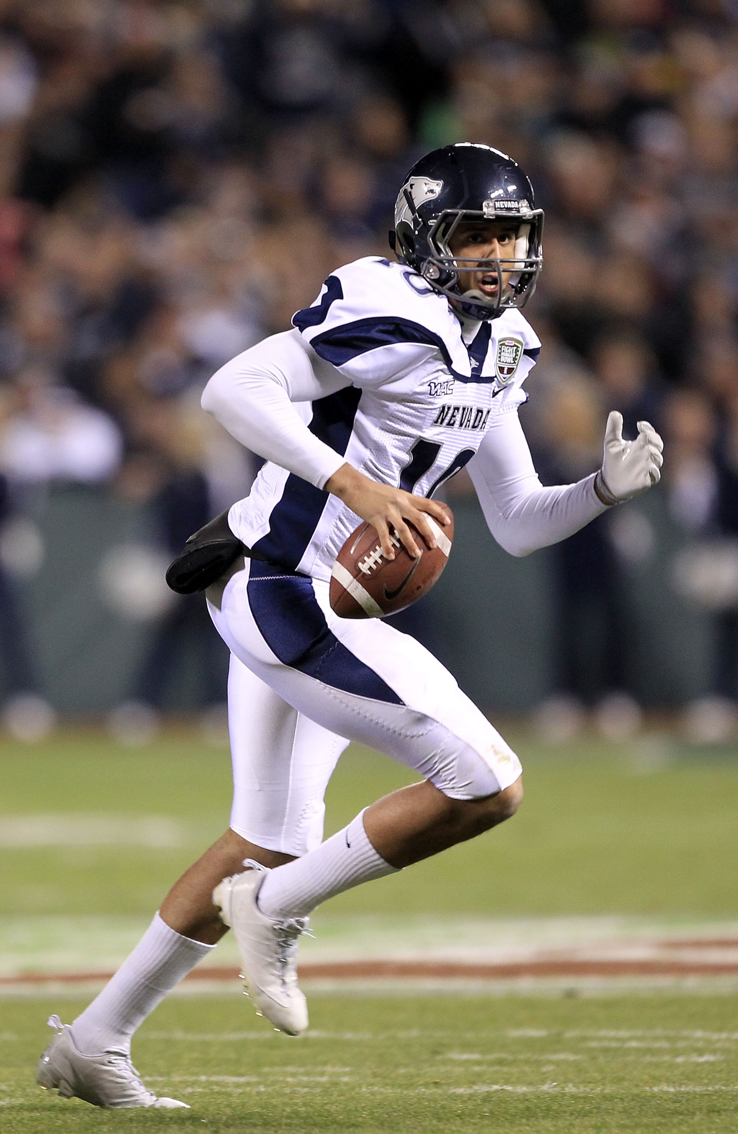 SAN FRANCISCO, CA - JANUARY 09:  Colin Kaepernick #10 of the Nevada Wolf Pack looks to pass the ball against Boston College during the Kraft Fight Hunger Bowl at AT&T Park on January 9, 2011 in San Francisco, California.  (Photo by Ezra Shaw/Getty Images)