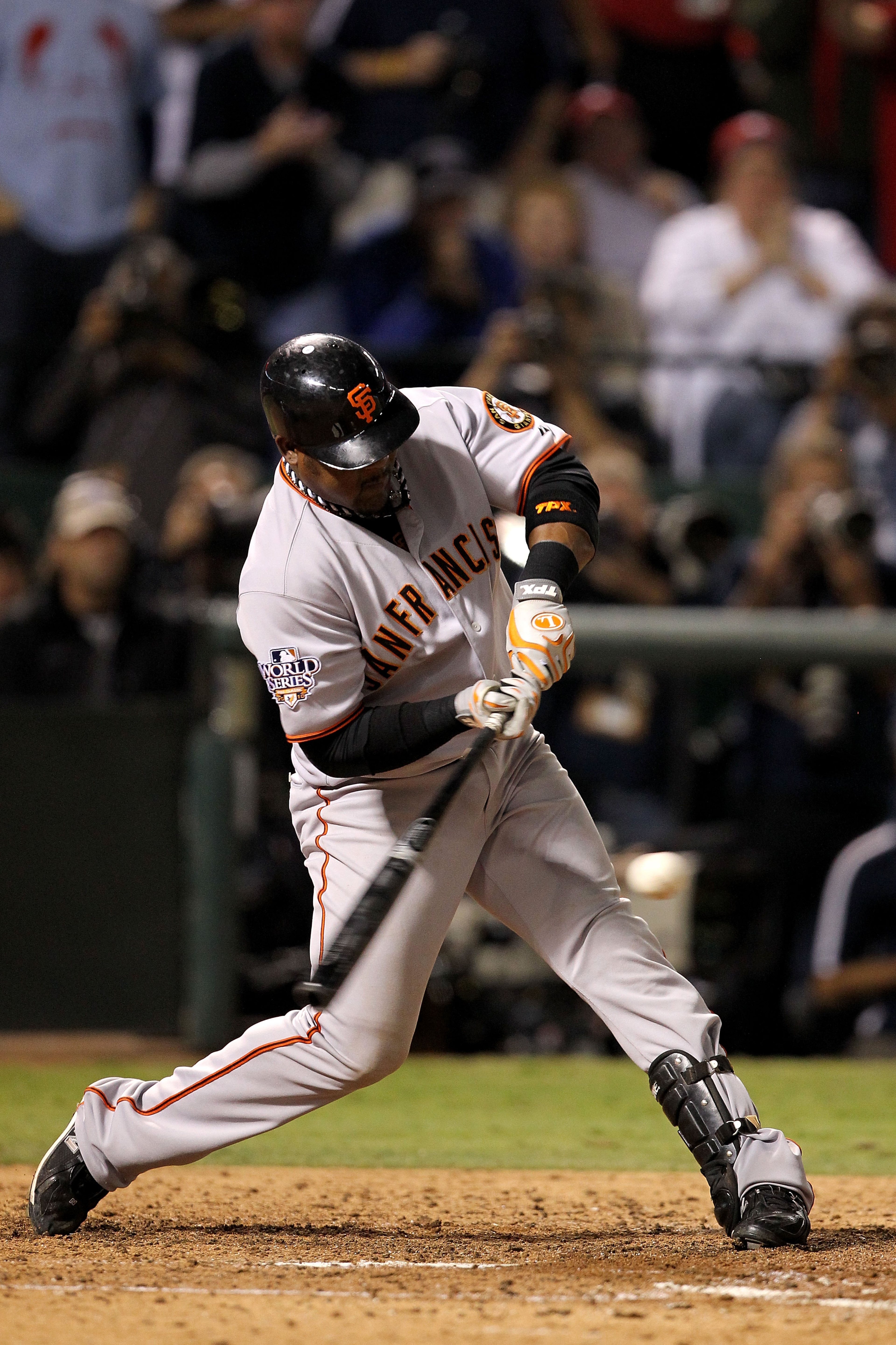 ARLINGTON, TX - NOVEMBER 01: Juan Uribe #5 of the San Francisco Giants singles in the seventh inning against the Texas Rangers in Game Five of the 2010 MLB World Series at Rangers Ballpark in Arlington on November 1, 2010 in Arlington, Texas. The Giants ARLINGTON, TX - NOVEMBER 01: Juan Uribe #5 of the San Francisco Giants singles in the seventh inning against the Texas Rangers in Game Five of the 2010 MLB World Series at Rangers Ballpark in Arlington on November 1, 2010 in Arlington, Texas. The Giants