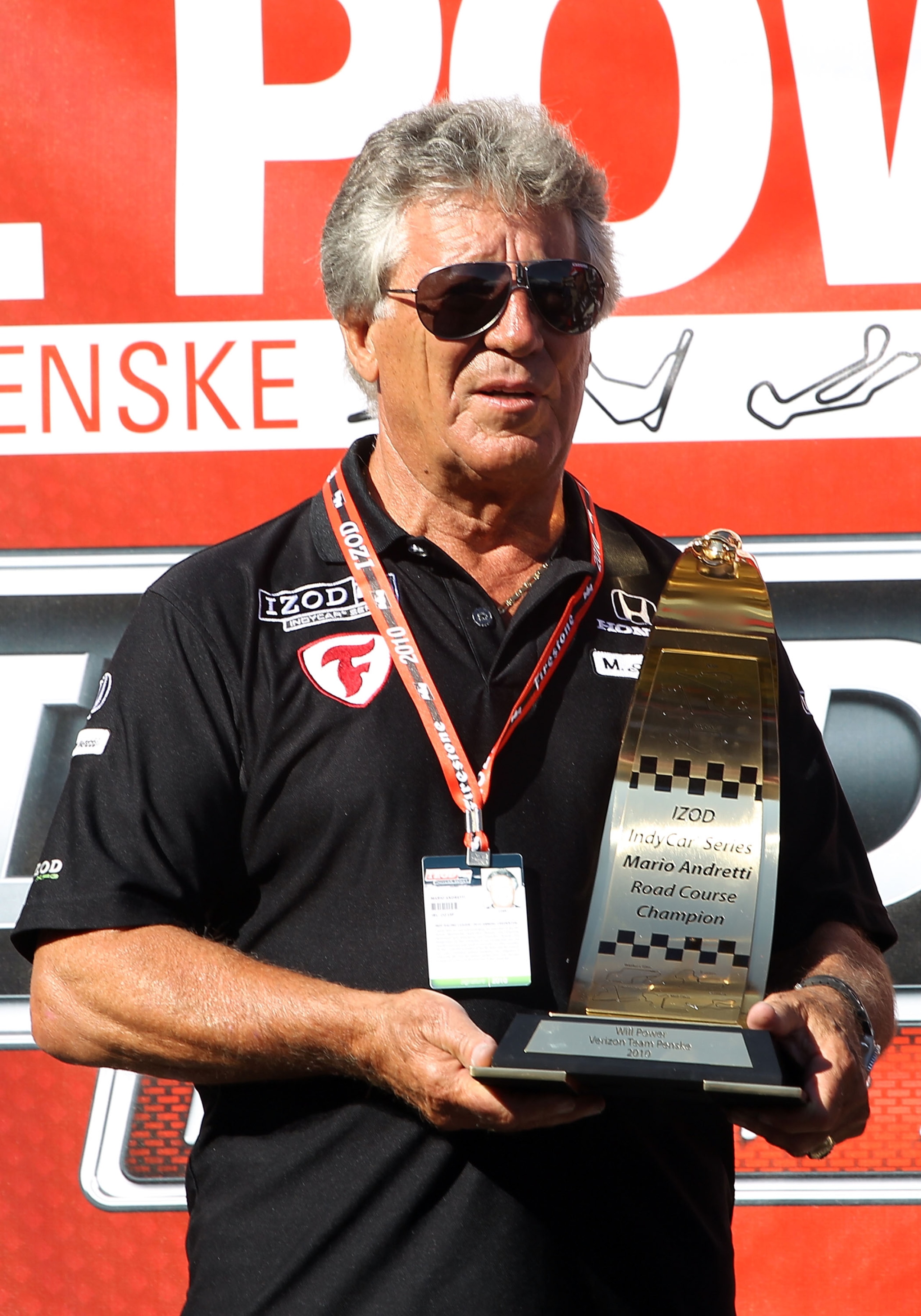 SONOMA, CA - AUGUST 22: Mario Andretti stands with Road Championship Trophy after the IZOD IndyCar Series Grand Prix of Sonoma at Infineon Raceway on August 22, 2010 in Sonoma, California. (Photo by Christian Petersen/Getty Images) SONOMA, CA - AUGUST 22: Mario Andretti stands with Road Championship Trophy after the IZOD IndyCar Series Grand Prix of Sonoma at Infineon Raceway on August 22, 2010 in Sonoma, California. (Photo by Christian Petersen/Getty Images)