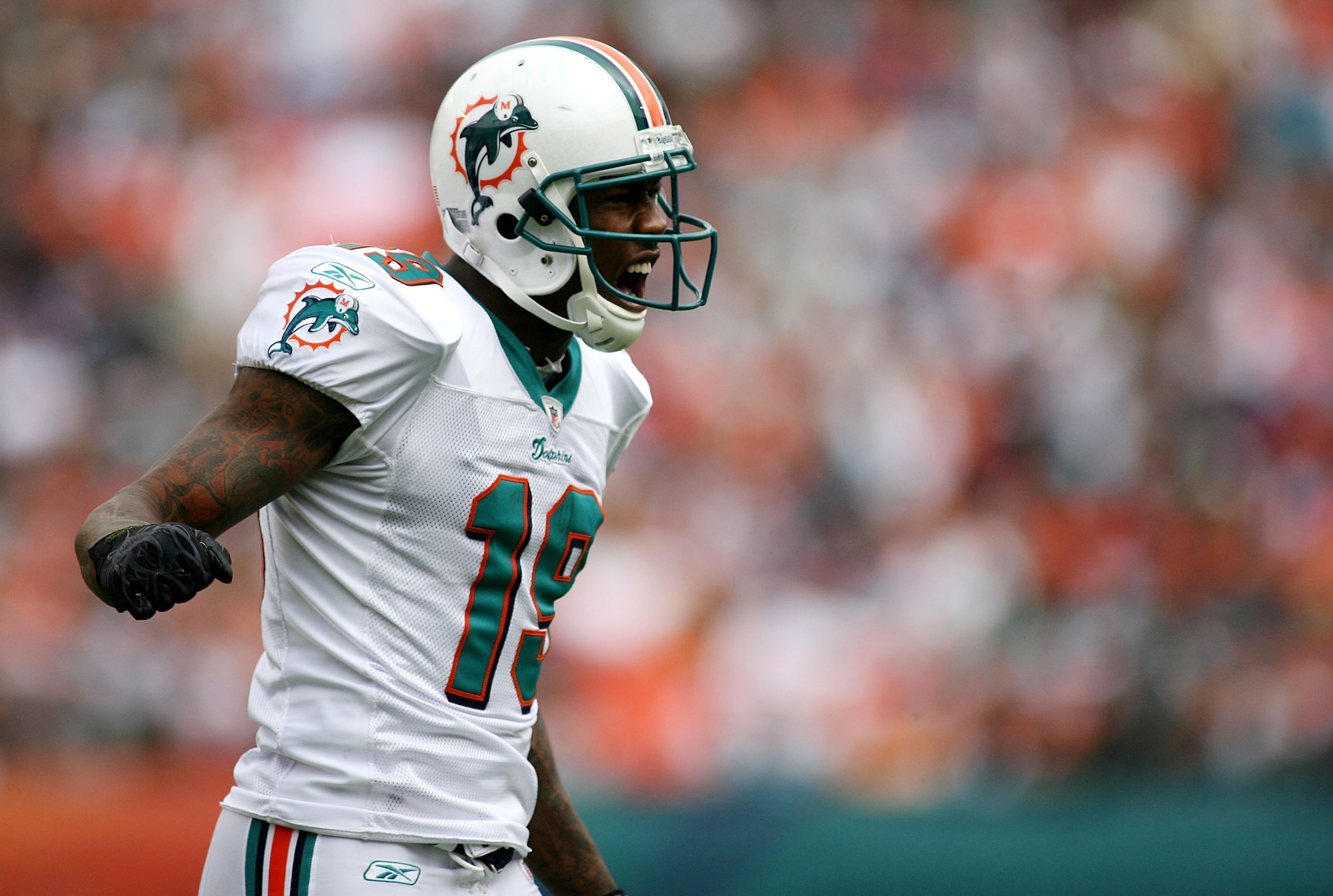 MIAMI - DECEMBER 19: Receiver Brandon Marshall #19 of the Miami Dolphins reacts against the Buffalo Bills at Sun Life Stadium on December 19, 2010 in Miami, Florida. The Bills defeated the Dolphins 17-14. (Photo by Marc Serota/Getty Images) MIAMI - DECEMBER 19: Receiver Brandon Marshall #19 of the Miami Dolphins reacts against the Buffalo Bills at Sun Life Stadium on December 19, 2010 in Miami, Florida. The Bills defeated the Dolphins 17-14. (Photo by Marc Serota/Getty Images)