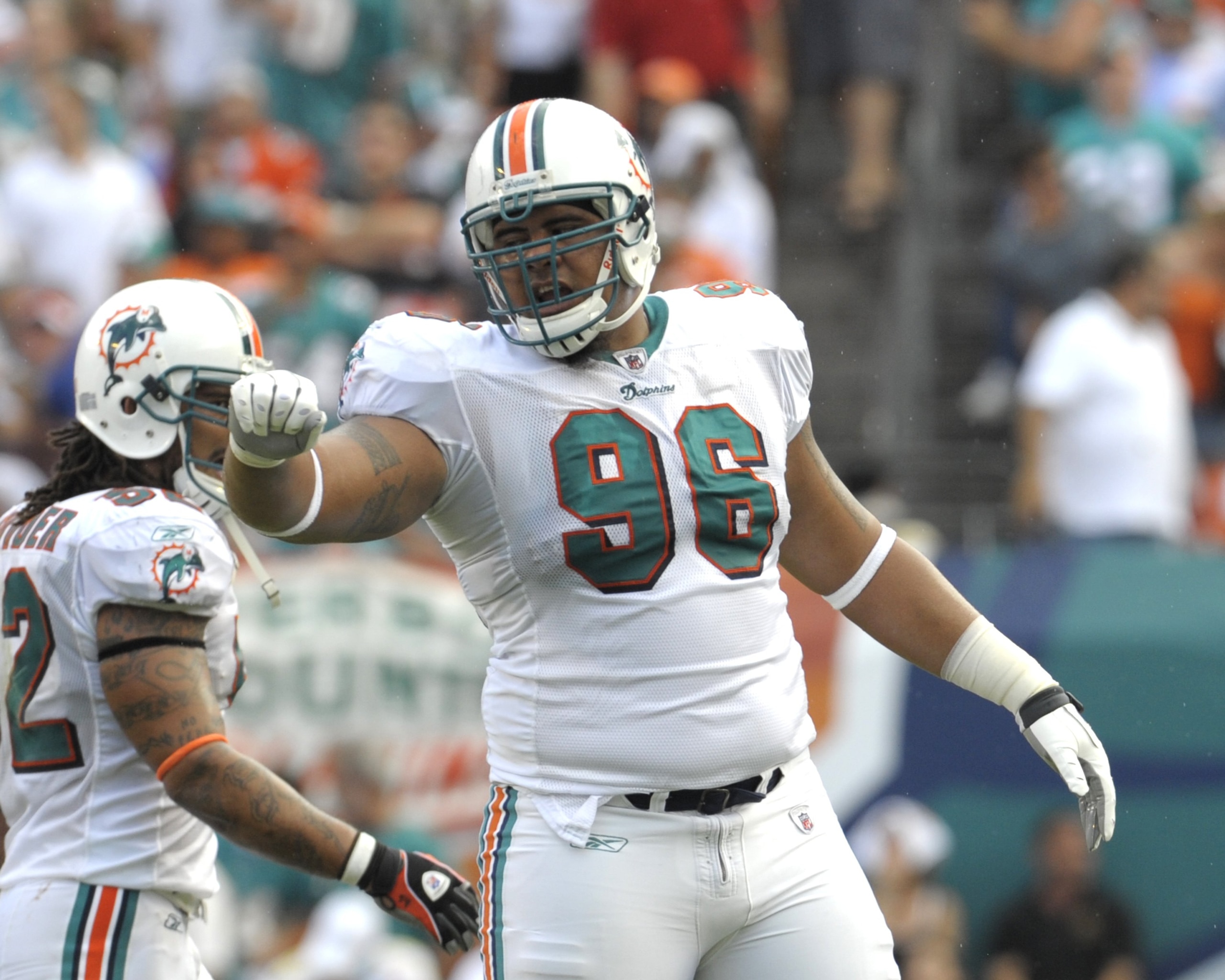 MIAMI, FL - JANUARY 4:  Defensive tackle Paul Soliai #96 of the Miami Dolphins sets for play against the Baltimore Ravens in an NFL Wildcard Playoff Game at Dolphins Stadium on January 4, 2009 in Miami, Florida.  (Photo by Al Messerschmidt/Getty Images)
