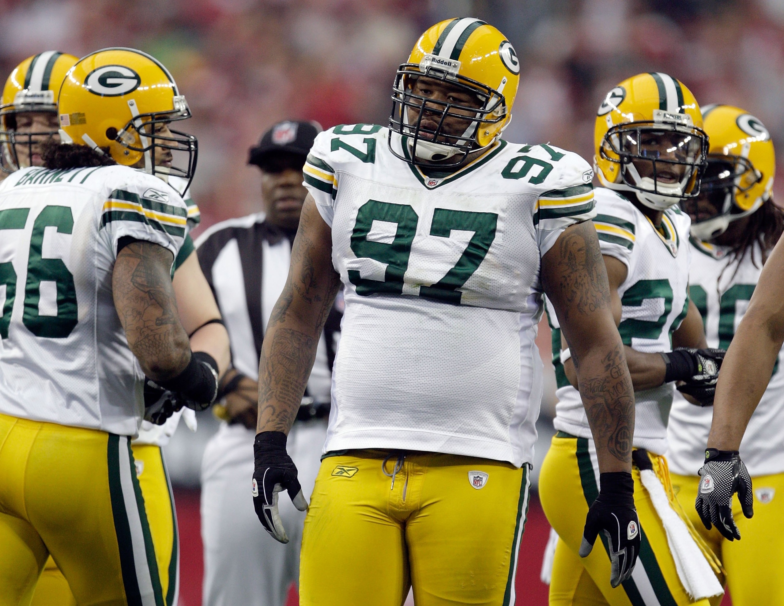 GLENDALE, AZ - JANUARY 03:  Johnny Jolly #97 of the Green Bay Packers looks on from the field against the Arizona Cardinals at University of Phoenix Stadium on January 3, 2010 in Glendale, Arizona.  (Photo by Jamie Squire/Getty Images)