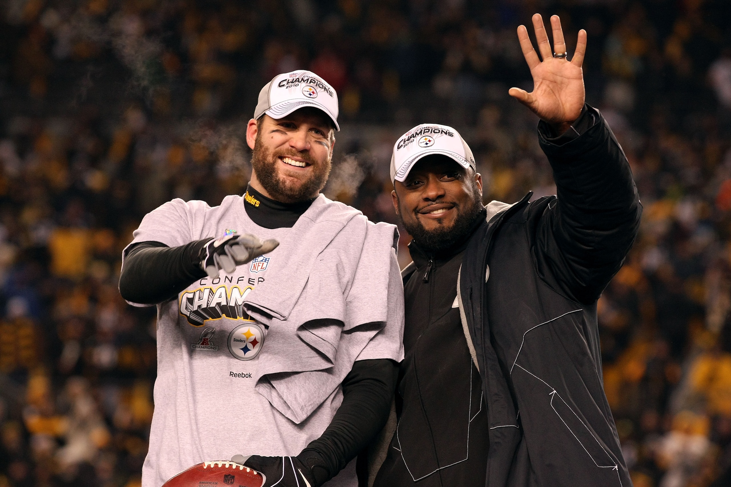 PITTSBURGH, PA - JANUARY 23:  Ben Roethlisberger #7 and head coach Mike Tomlin of the Pittsburgh Steelers celebrate their 24 to 19 win over the New York Jets in the 2011 AFC Championship game at Heinz Field on January 23, 2011 in Pittsburgh, Pennsylvania.