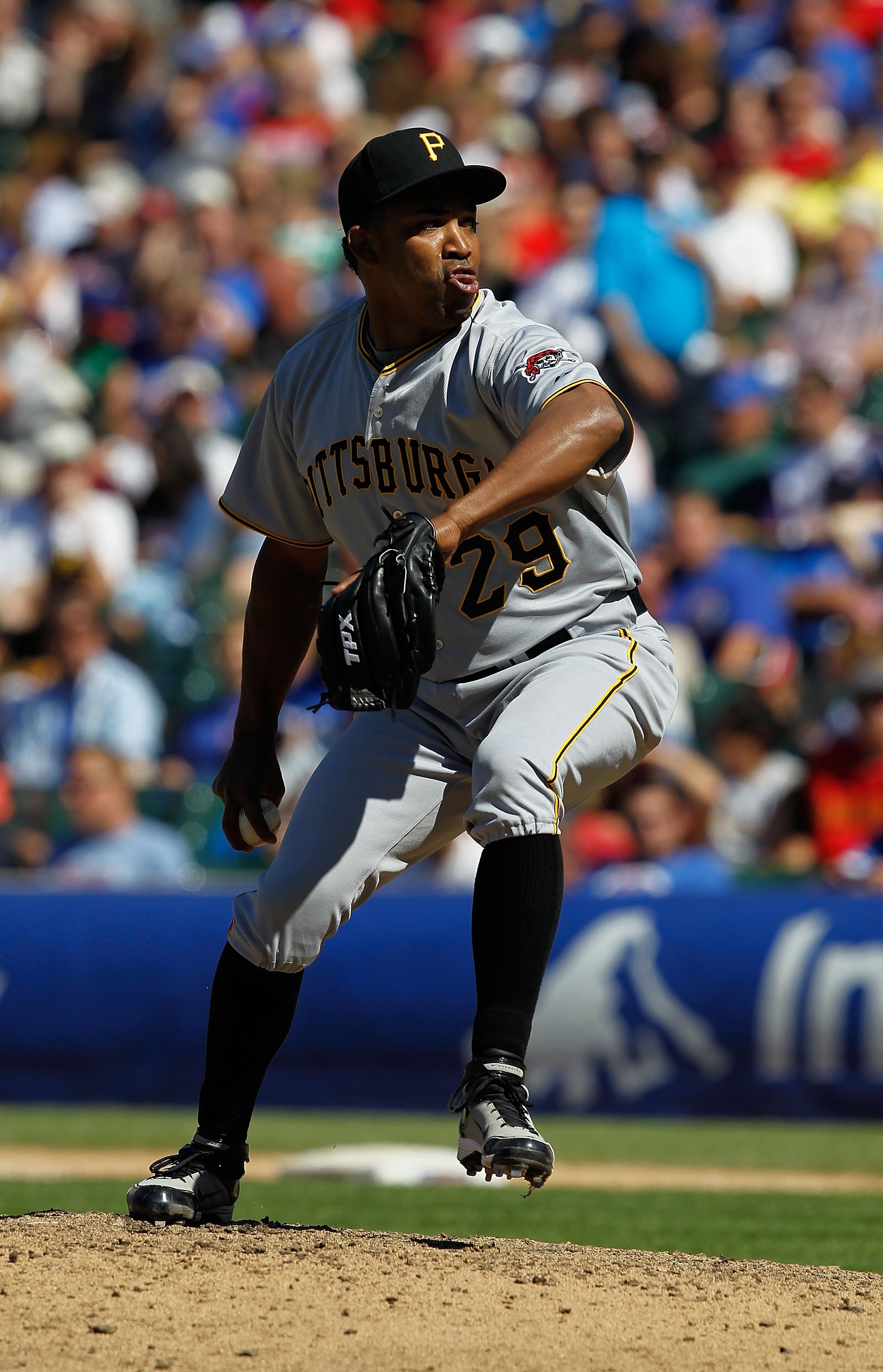 CHICAGO - JUNE 30: Octavio Dotel #29 of the Pittsburgh Pirates pitches in the 9th inning on his way to a save against the Chicago Cubs at Wrigley Field on June 30, 2010 in Chicago, Illinois. The Pirates defeated the Cubs 2-0. (Photo by Jonathan Daniel/Get