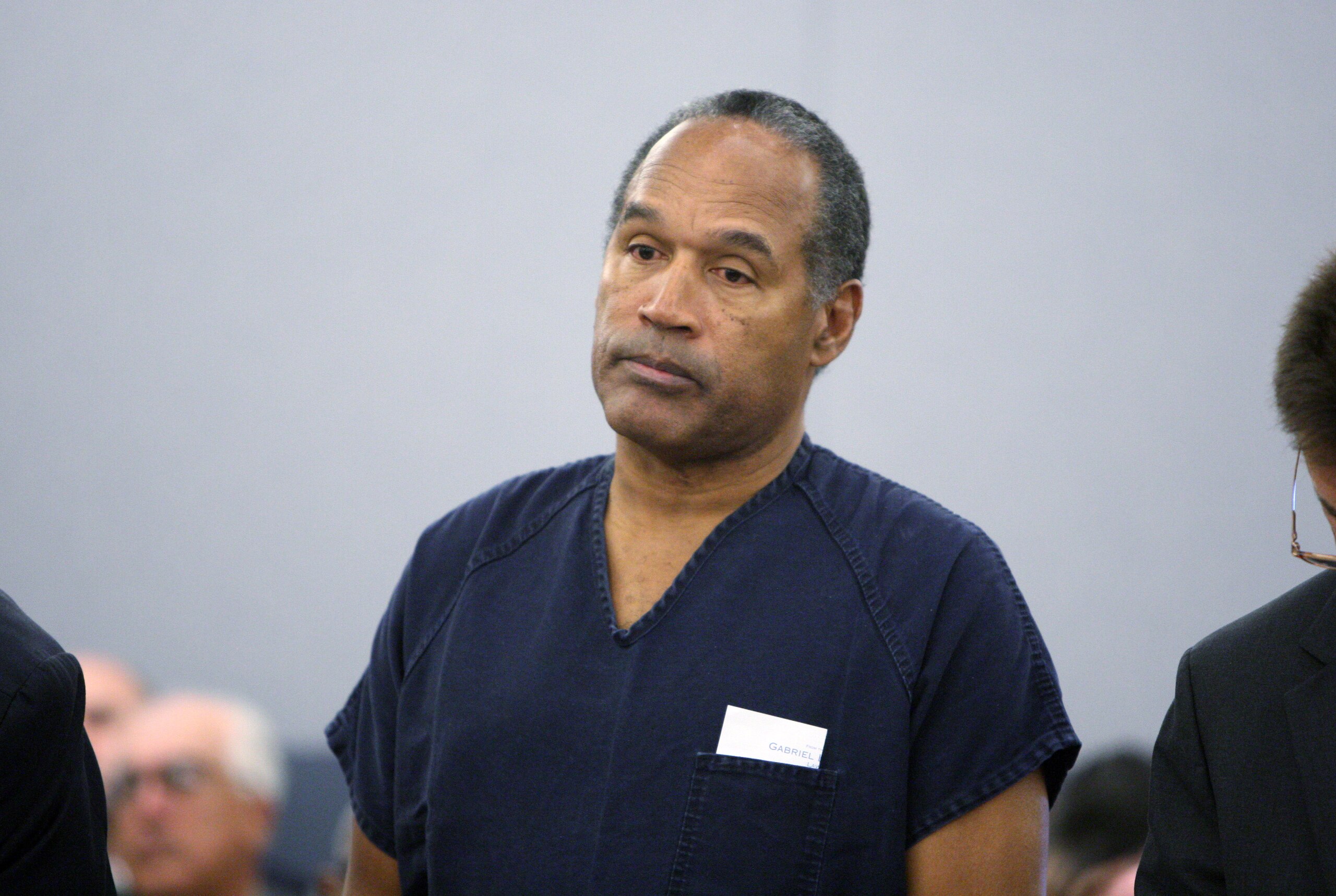 LAS VEGAS - DECEMBER 5:  OJ Simpson stands during sentencing at the Clark County Regional Justice Center December 5, 2008 in Las Vegas, Nevada.  Simpson and co-defendant Clarence 'C.J.' Stewart were sentenced on 12 charges, including felony kidnapping, ar