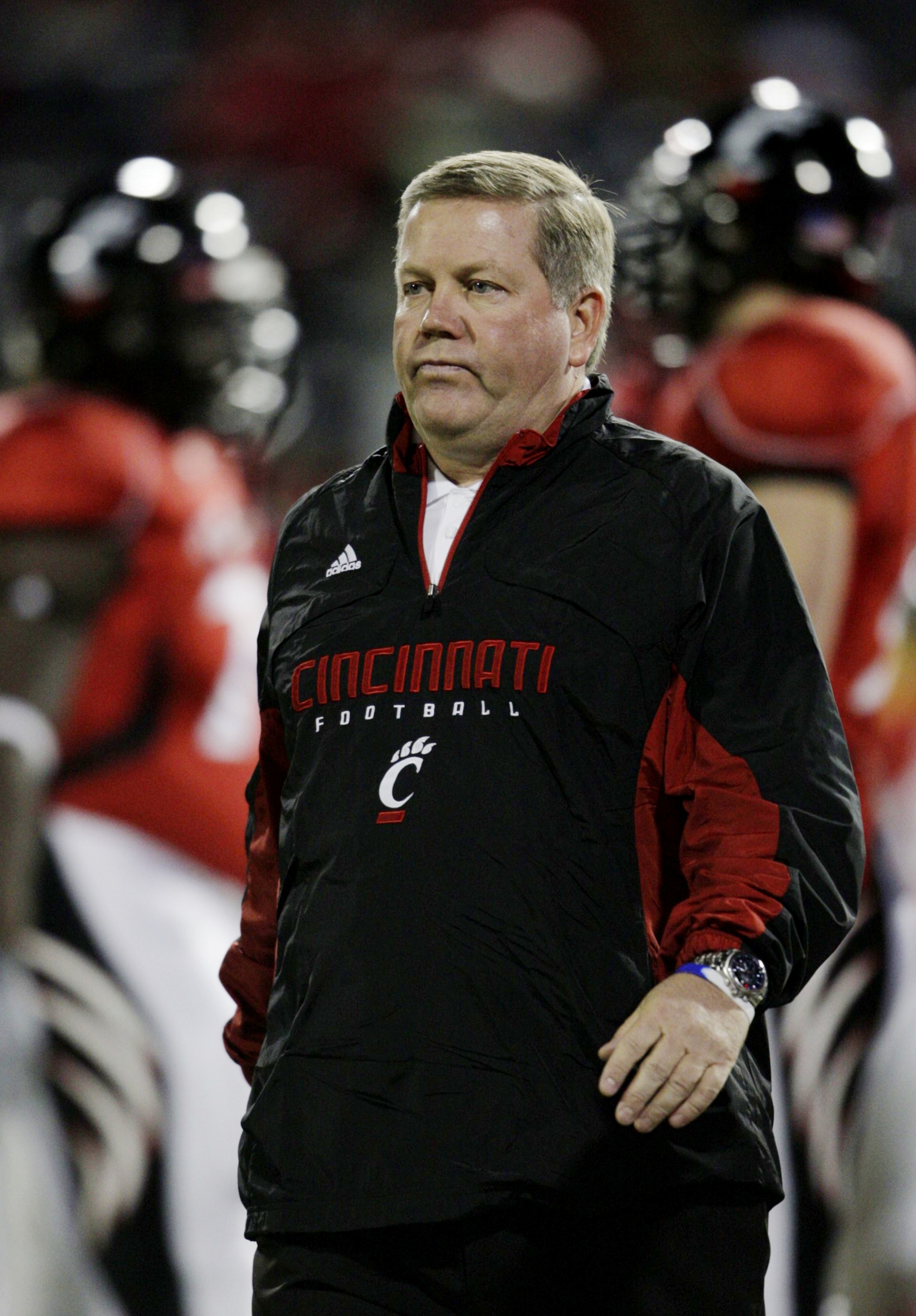 CINCINNATI - NOVEMBER 13:  Head coach Brian Kelly of the the Cincinnati Bearcats walks on the field during warm ups before the game against the West Virginia Mountaineers at Nippert Stadium on November 13, 2009 in Cincinnati, Ohio.  (Photo by Andy Lyons/G