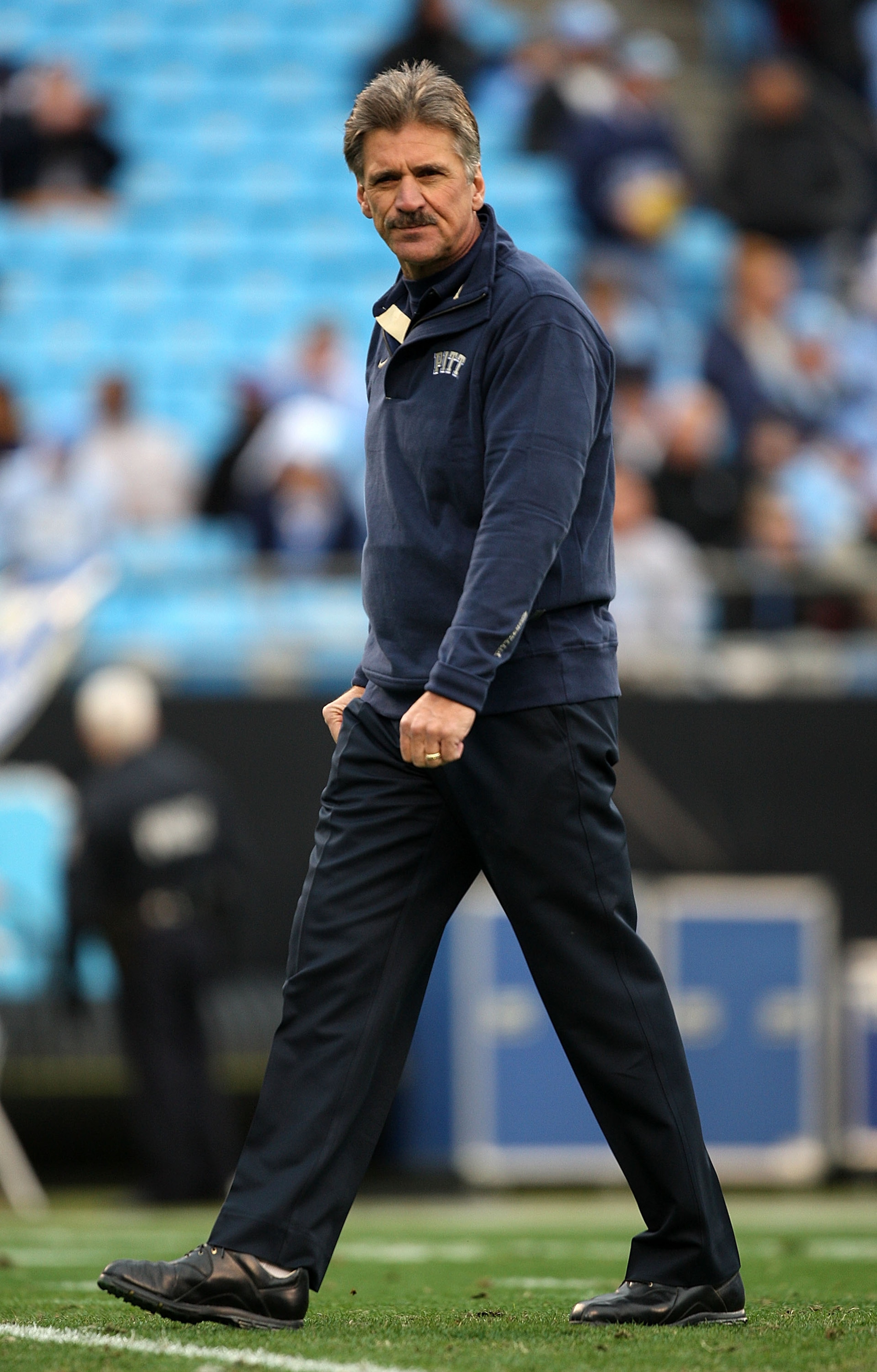 CHARLOTTE, NC - DECEMBER 26:  Head coach Dave Wannstedt of the Pittsburgh Panthers walks around before the start of their game against the North Carolina Tar Heels on December 26, 2009 in Charlotte, North Carolina.  (Photo by Streeter Lecka/Getty Images)