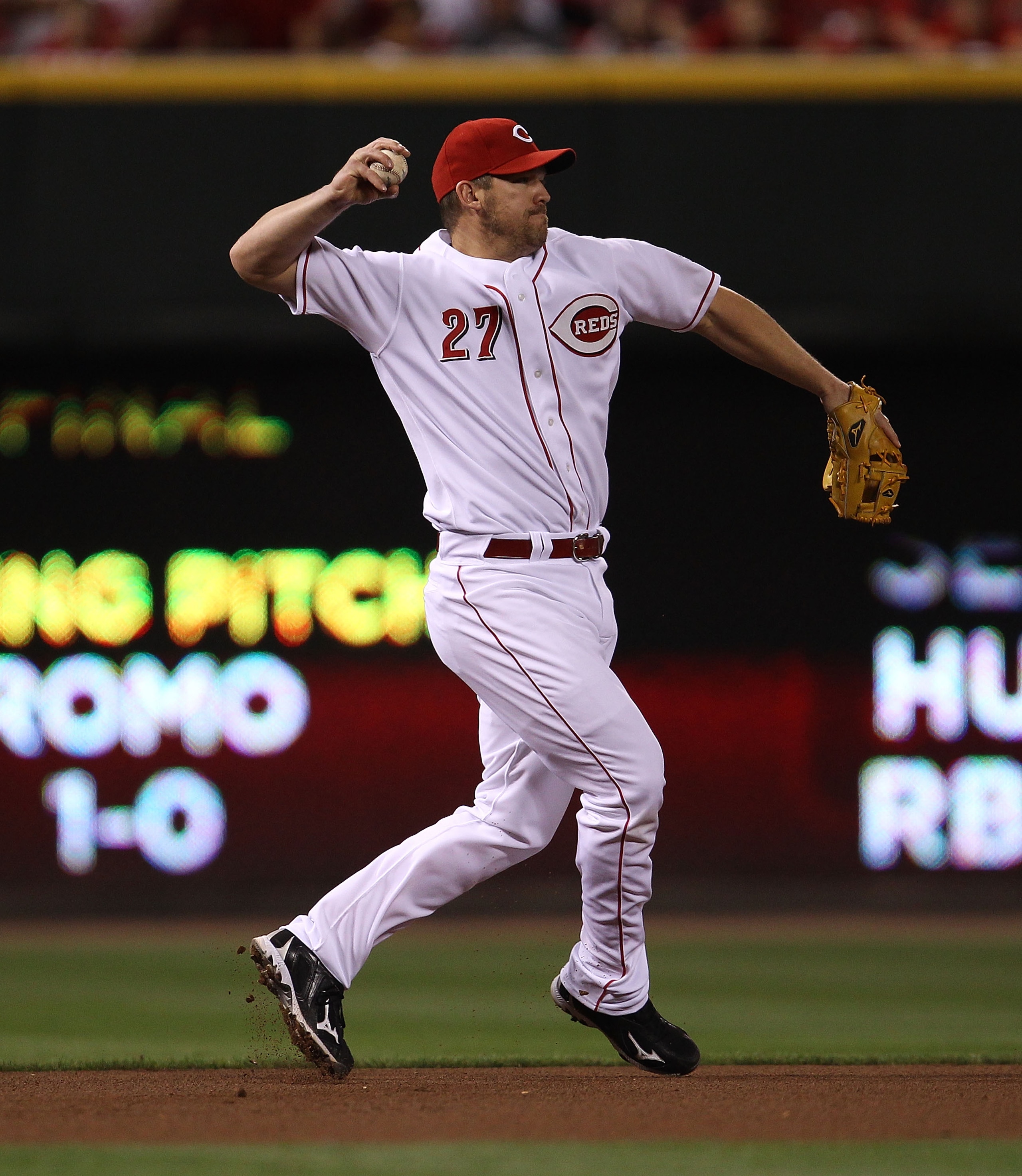 CINCINNATI - OCTOBER 10: Scott Rolen #27 of the Cincinnati Reds throws to 2nd base against the Philadelphia Phillies during game 3 of the NLDS at Great American Ball Park on October 10, 2010 in Cincinnati, Ohio. The Phillies defeated the Reds 2-0. (Photo CINCINNATI - OCTOBER 10: Scott Rolen #27 of the Cincinnati Reds throws to 2nd base against the Philadelphia Phillies during game 3 of the NLDS at Great American Ball Park on October 10, 2010 in Cincinnati, Ohio. The Phillies defeated the Reds 2-0. (Photo