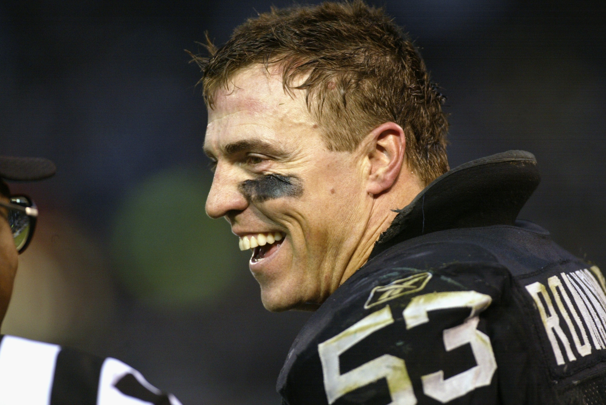 OAKLAND, CA - JANUARY 12:  Bill Romanowski #53 of the Oakland Raiders celebrates after contributing to the win by recovering a fumble against the New York Jets during the AFC Division Playoff game at Network Associates Coliseum on January 12, 2003 in Oakl