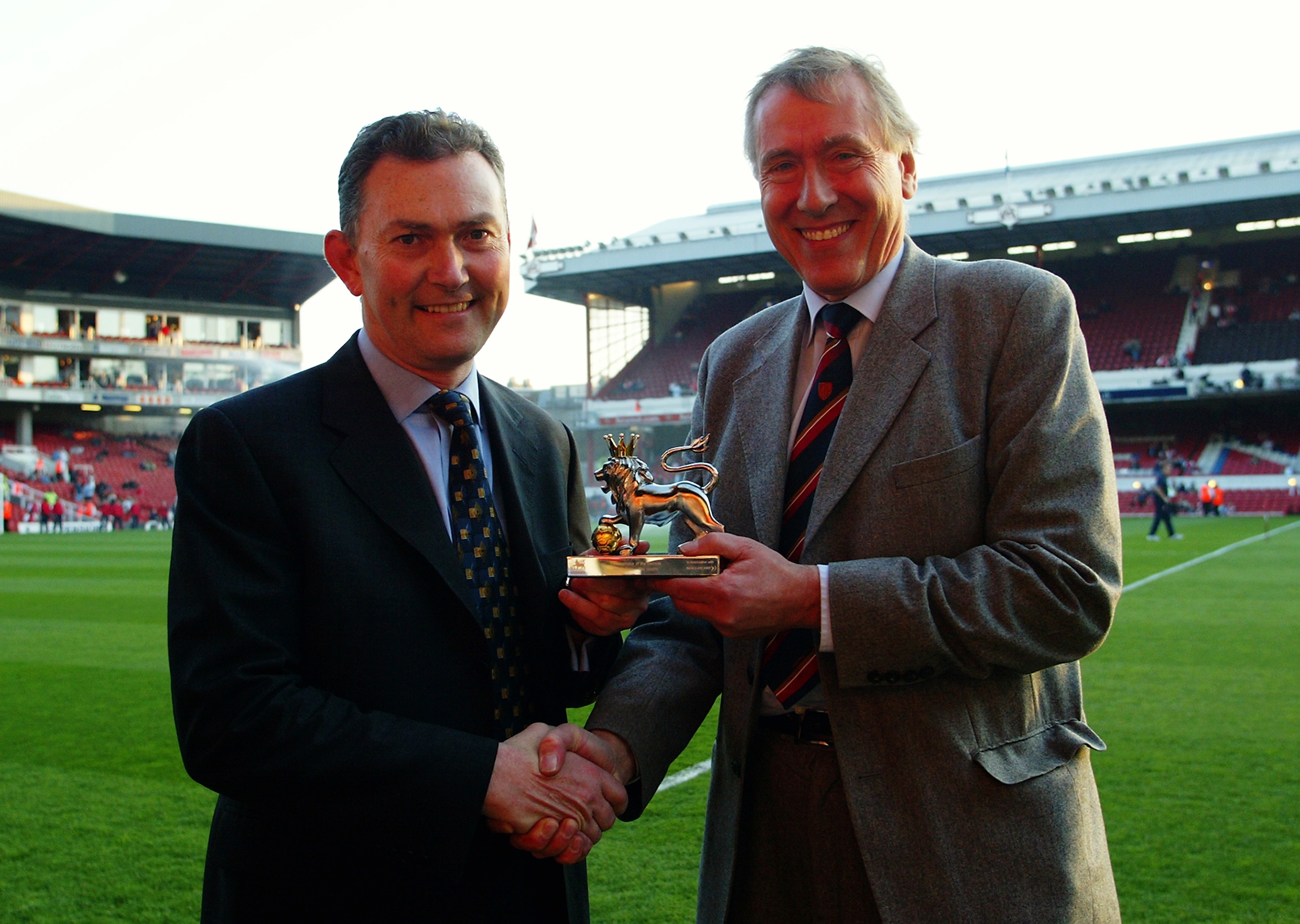 LONDON - APRIL 16:   Sky TV Commentator Martin Tyler receives the award for Premiership Commentator of the Decade from Richard Scudamore before the FA Barclaycard Premiership match between Arsenal and Manchester United held on April 16, 2003 at Highbury i