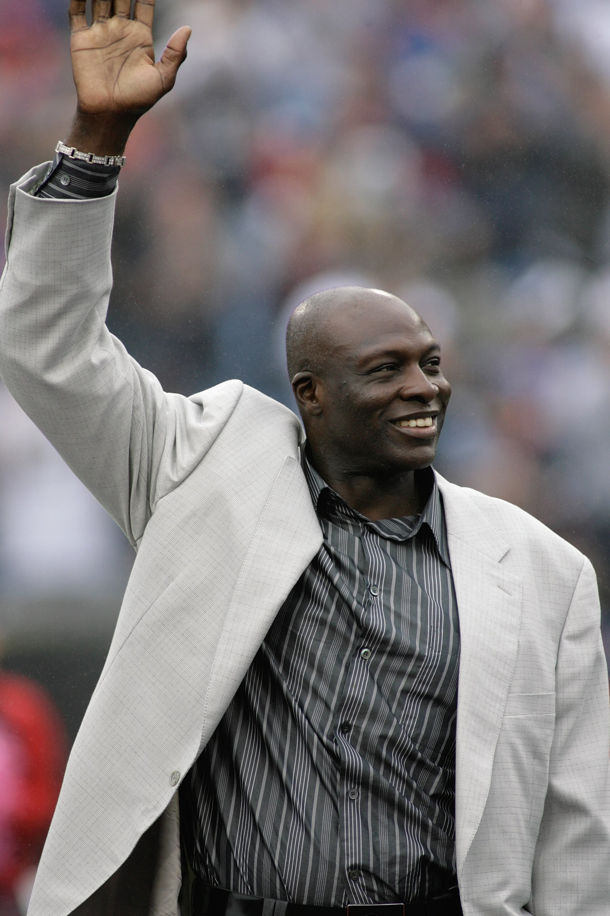 ORCHARD PARK, NY - SEPTEMBER 21:  Former Buffalo Bills player Bruce Smith acknowledges the crowd after his name was added to the Ralph Wilson Stadium Wall of Fame during halftime of the game against the Oakland Raiders on September 21, 2008 at Ralph Wilso