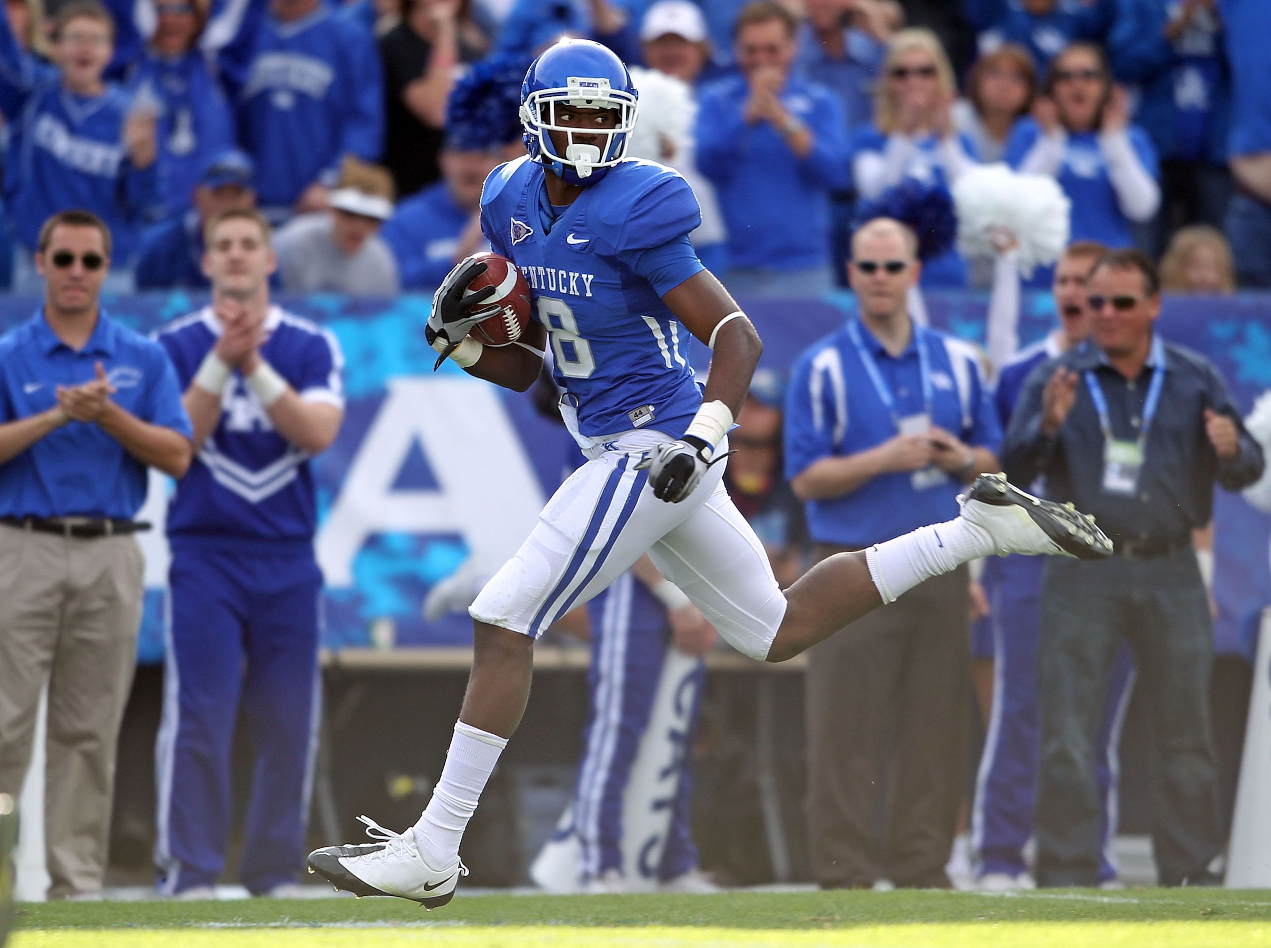 LEXINGTON, KY - NOVEMBER 13: Chris Matthews #8 of the Kentucky Wildcats runs for a touchdown after a reception during the game against the Vanderbilt Commodores at Commonwealth Stadium on November 13, 2010 in Lexington, Kentucky.  (Photo by Andy Lyons/Get