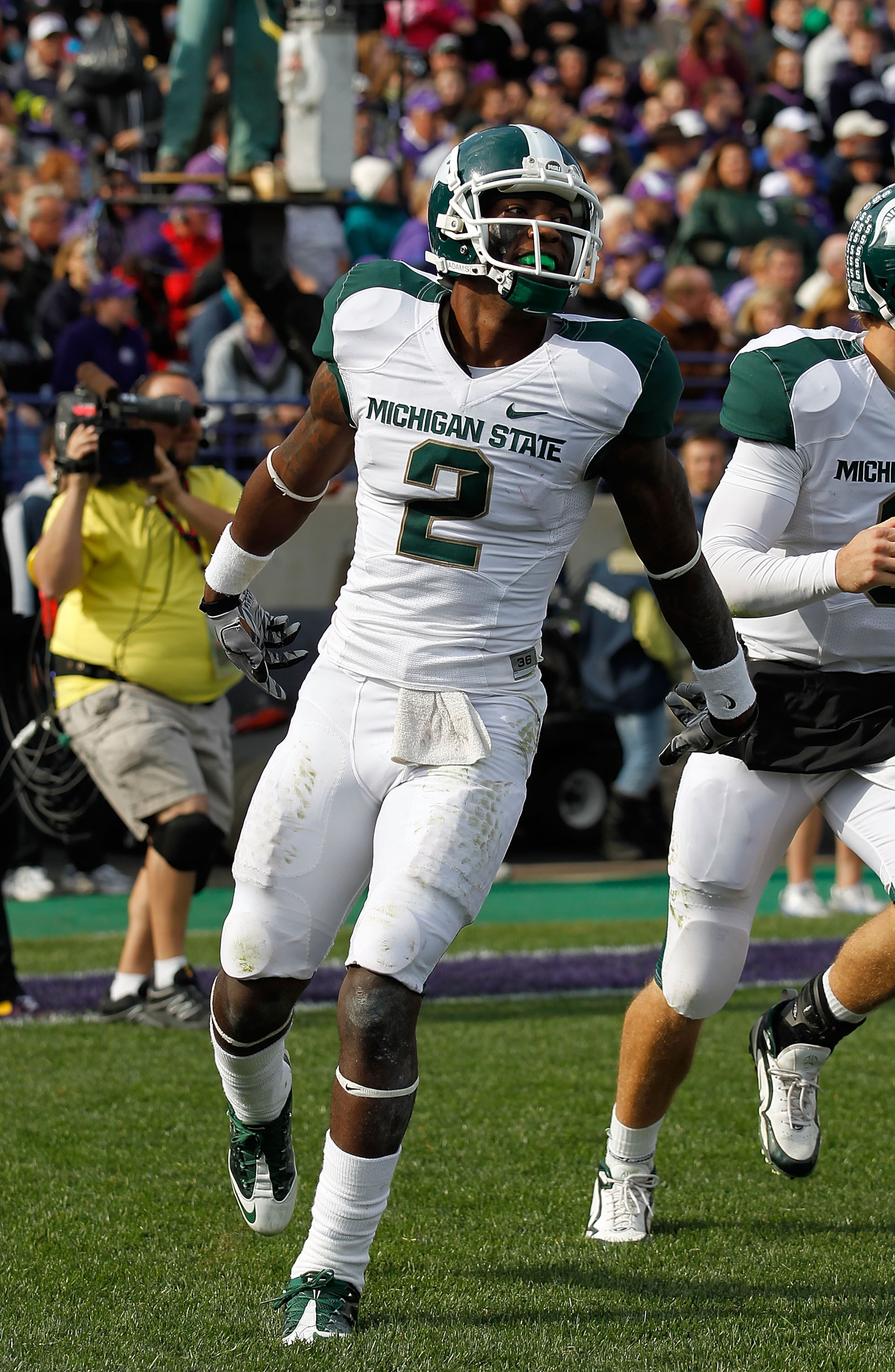 EVANSTON, IL - OCTOBER 23: Mark Dell #2 of the Michigan State Spartans celebrates a touchdown against the Northwestern Wildcats at Ryan Field on October 23, 2010 in Evanston, Illinois. Michigan State defeated Northwestern 35-27. (Photo by Jonathan Daniel/