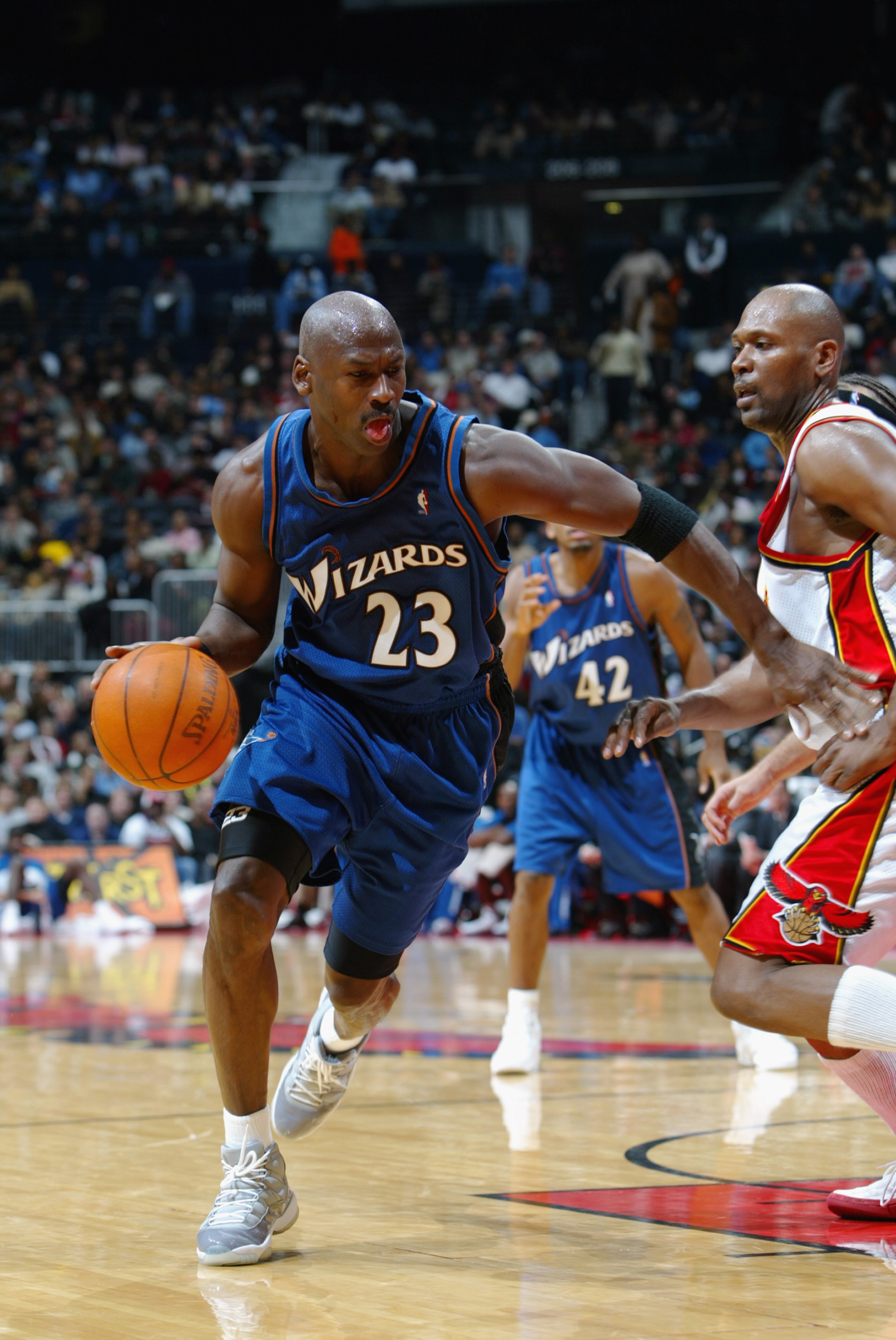 ATLANTA - DECEMBER 17:  Guard Michael Jordan #23 of the Washington Wizards drives toward the basket against the Atlanta Hawks during the second half of the game on December 17, 2002 at Phillips Arena in Atlanta, Georgia.  The Wizards won 109-99.  NOTE TO