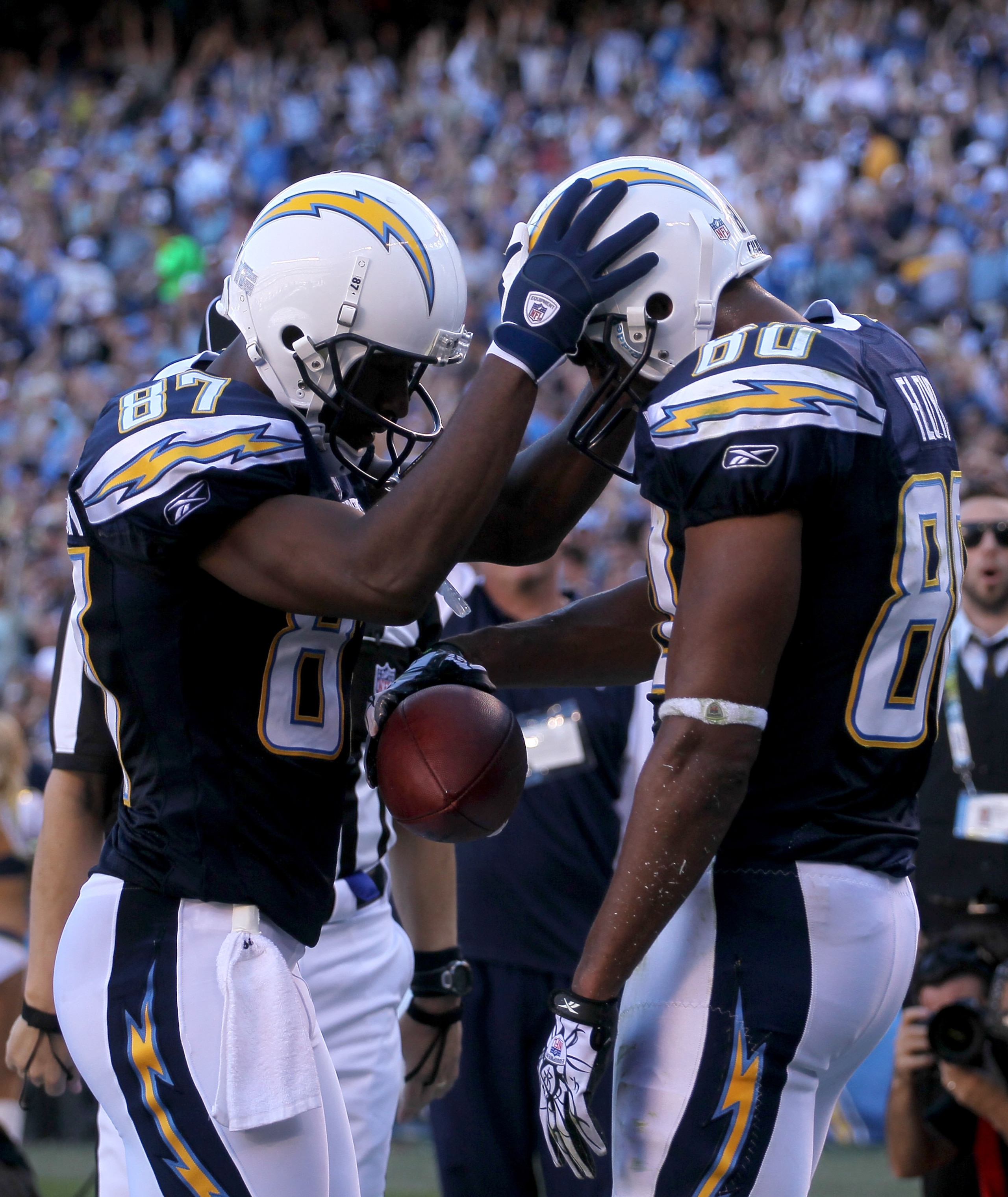 SAN DIEGO - DECEMBER 12:  Wide receivers Malcom Floyd #80 and Kelley Washington #87 of the San Diego Chargers celebrate after Floyd's nine yard touchdown catch against the Kansas City Chiefs at Qualcomm Stadium on December 12, 2010 in San Diego, Californi