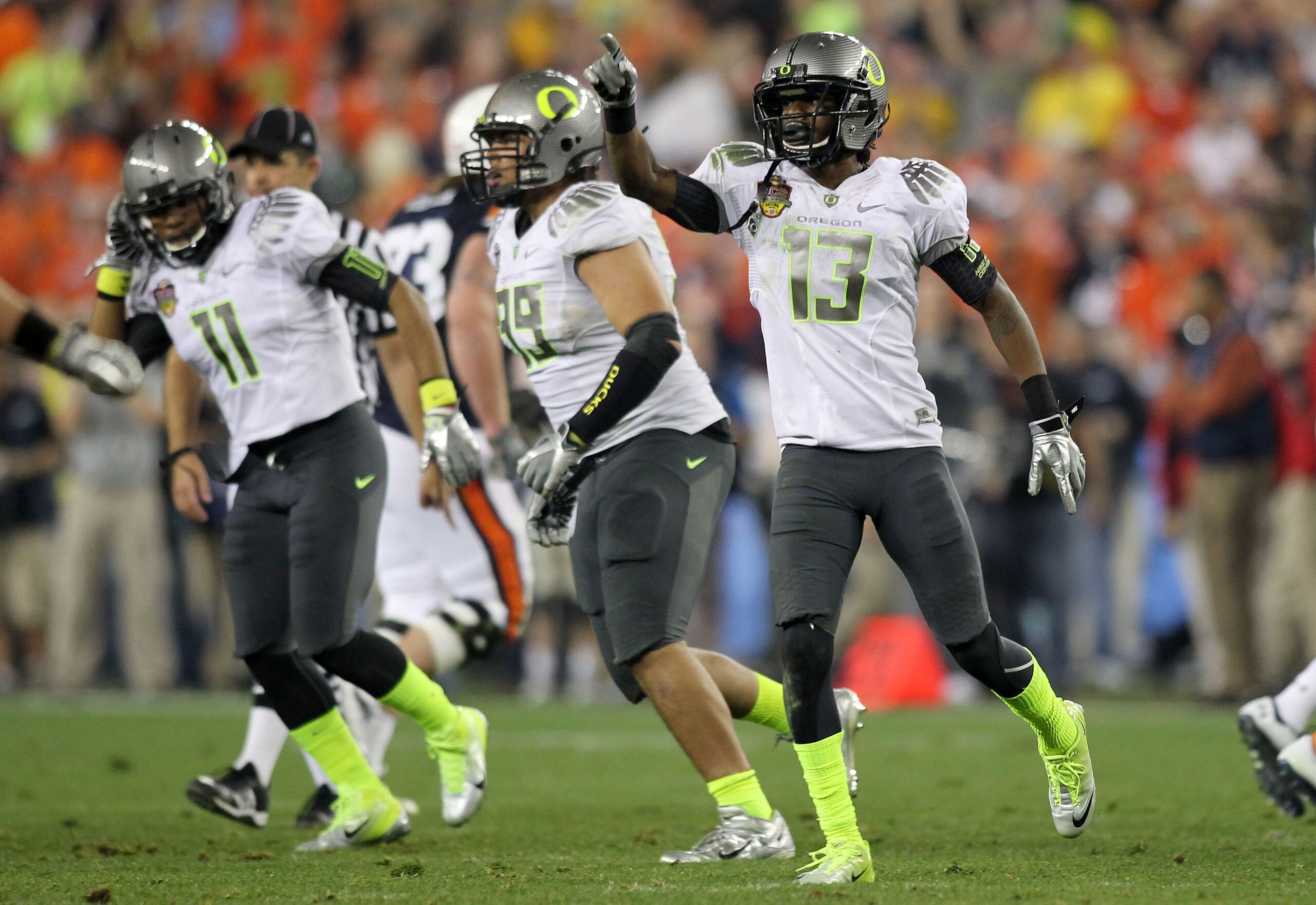 GLENDALE, AZ - JANUARY 10: Cliff Harris #13 of the Oregon Ducks reacts during their game against the Auburn Tigers during the Tostitos BCS National Championship Game at University of Phoenix Stadium on January 10, 2011 in Glendale, Arizona. (Photo by Jo GLENDALE, AZ - JANUARY 10: Cliff Harris #13 of the Oregon Ducks reacts during their game against the Auburn Tigers during the Tostitos BCS National Championship Game at University of Phoenix Stadium on January 10, 2011 in Glendale, Arizona. (Photo by Jo