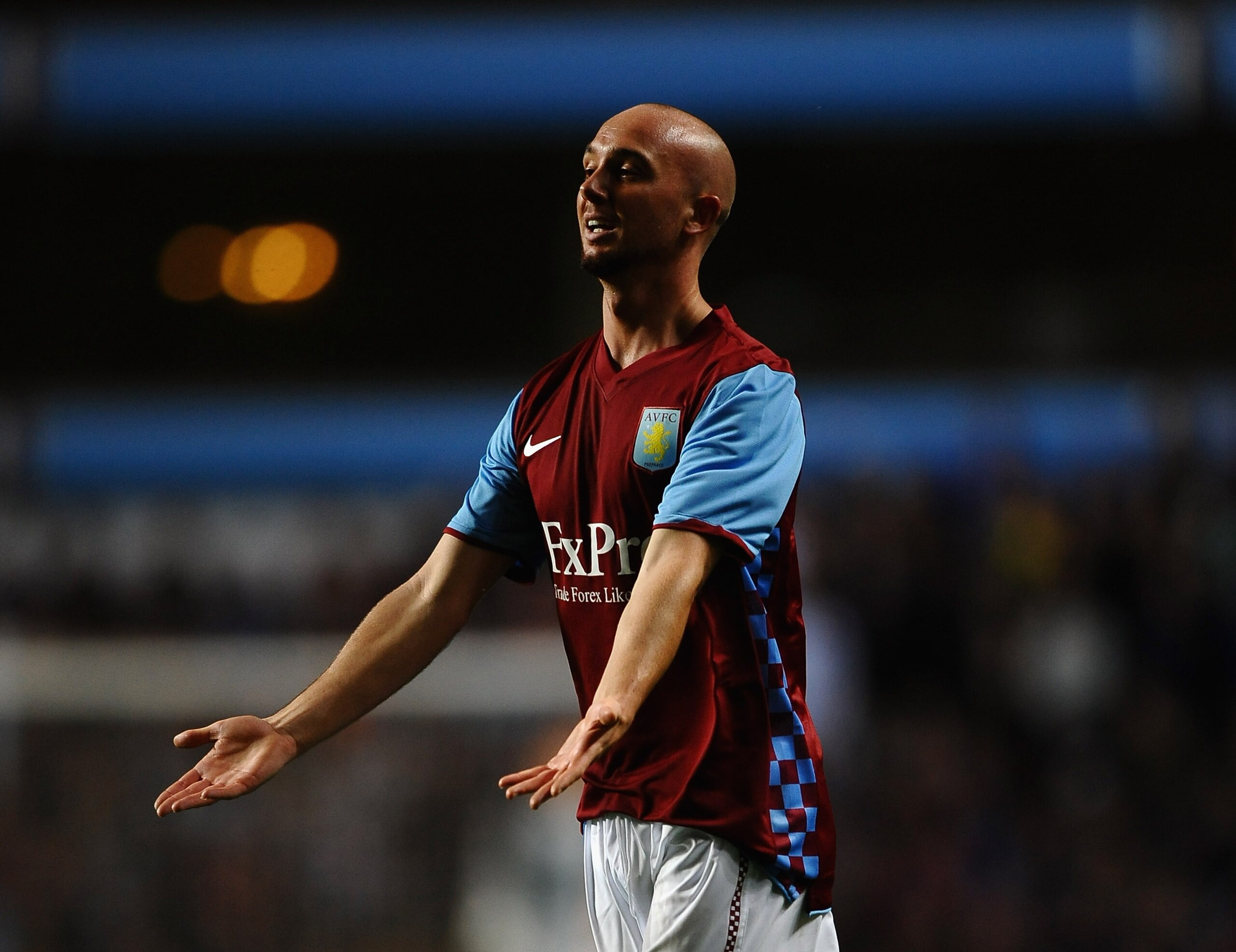 BIRMINGHAM, ENGLAND - AUGUST 26:  Stephen Ireland of Aston Villa shows his frustrations during the UEFA Europa League  Play Off, second leg match between Aston Villa and SK Rapid Vienna at Villa Park on August 26, 2010 in Birmingham, England.  (Photo by L