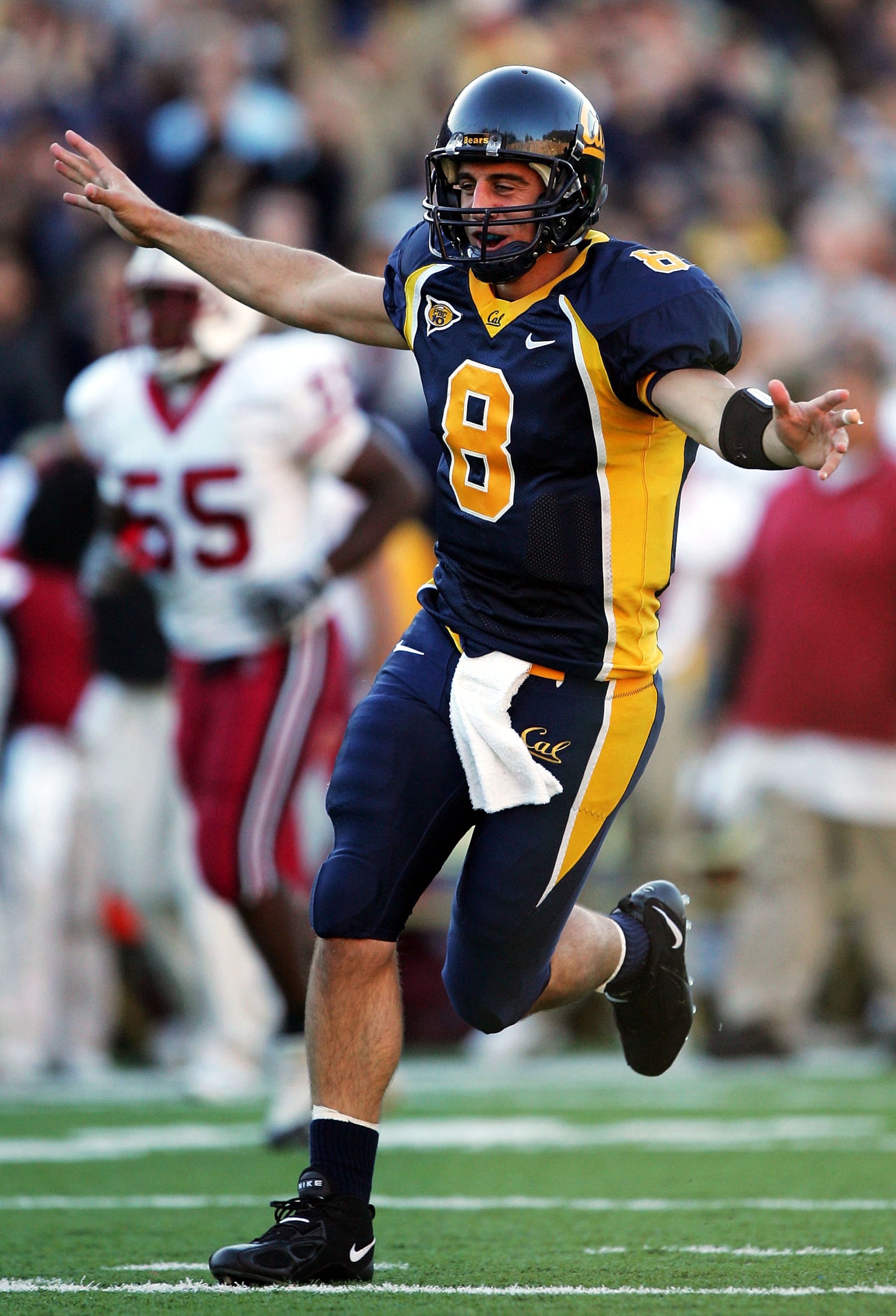 BERKELEY, CA - NOVEMBER 20:  Aaron Rodgers #8 of the California Golden Bears celebrates after throwing a touchdown pass to Burl Toeler against the Stanford Cardinals at Memorial Stadium on November 20, 2004 in Berkeley, California.  (Photo by Jed Jacobsoh