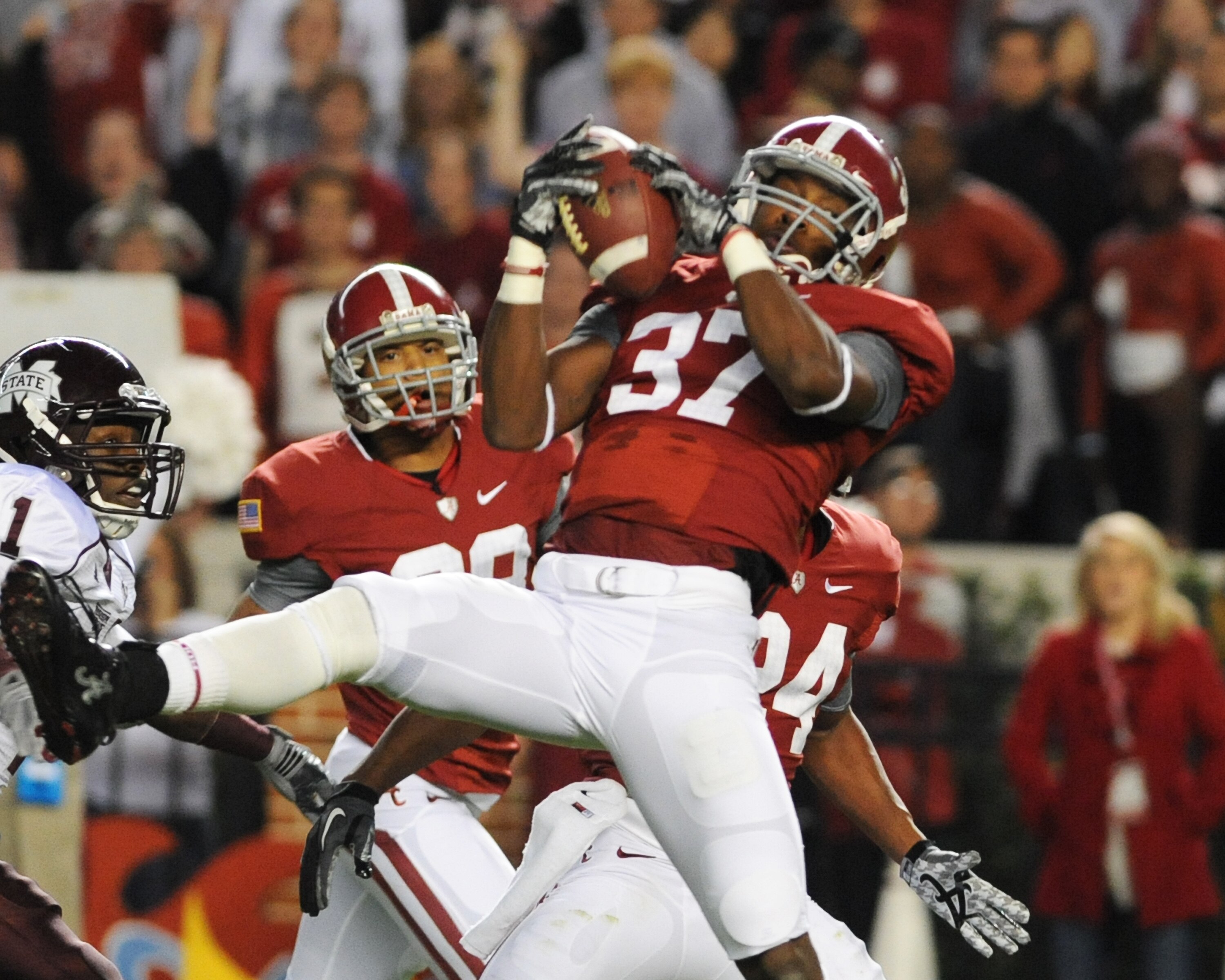 TUSCALOOSA, AL - NOVEMBER 13: Defensive back Robert Lester #37 of the Alabama Crimson Tide intercepts a pass against the Mississippi State Bulldogs November 13, 2010 at Bryant-Denny Stadium in Tuscaloosa, Alabama.  (Photo by Al Messerschmidt/Getty Images)
