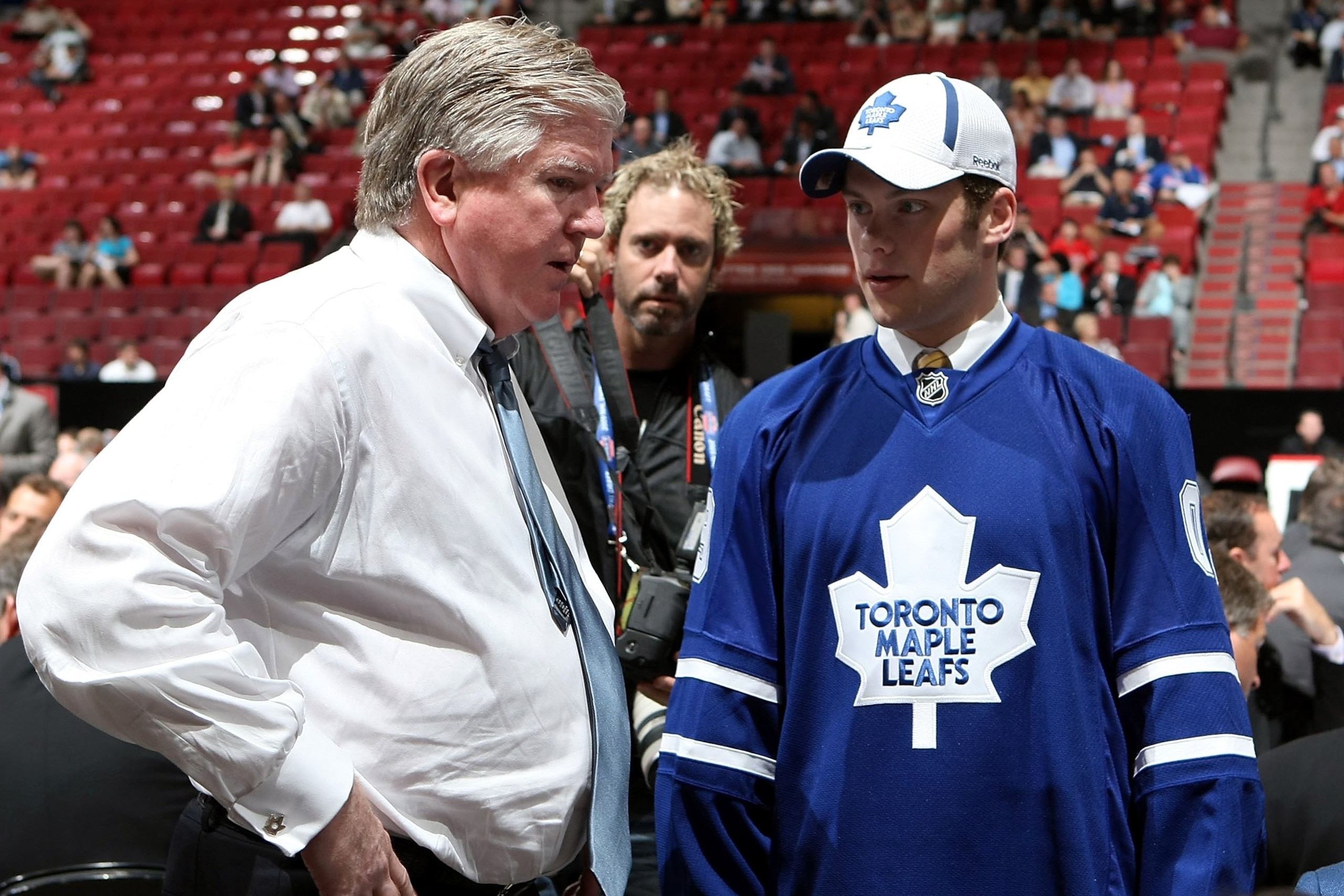 MONTREAL, QC - JUNE 27:  Kenny Ryan speaks to General Manager Brian Burke of the Toronto Maple Leafs organization after he was drafted by the Leafs in the second round during the 2009 NHL Entry Draft at the Bell Centre on June 27, 2009 in Montreal, Quebec