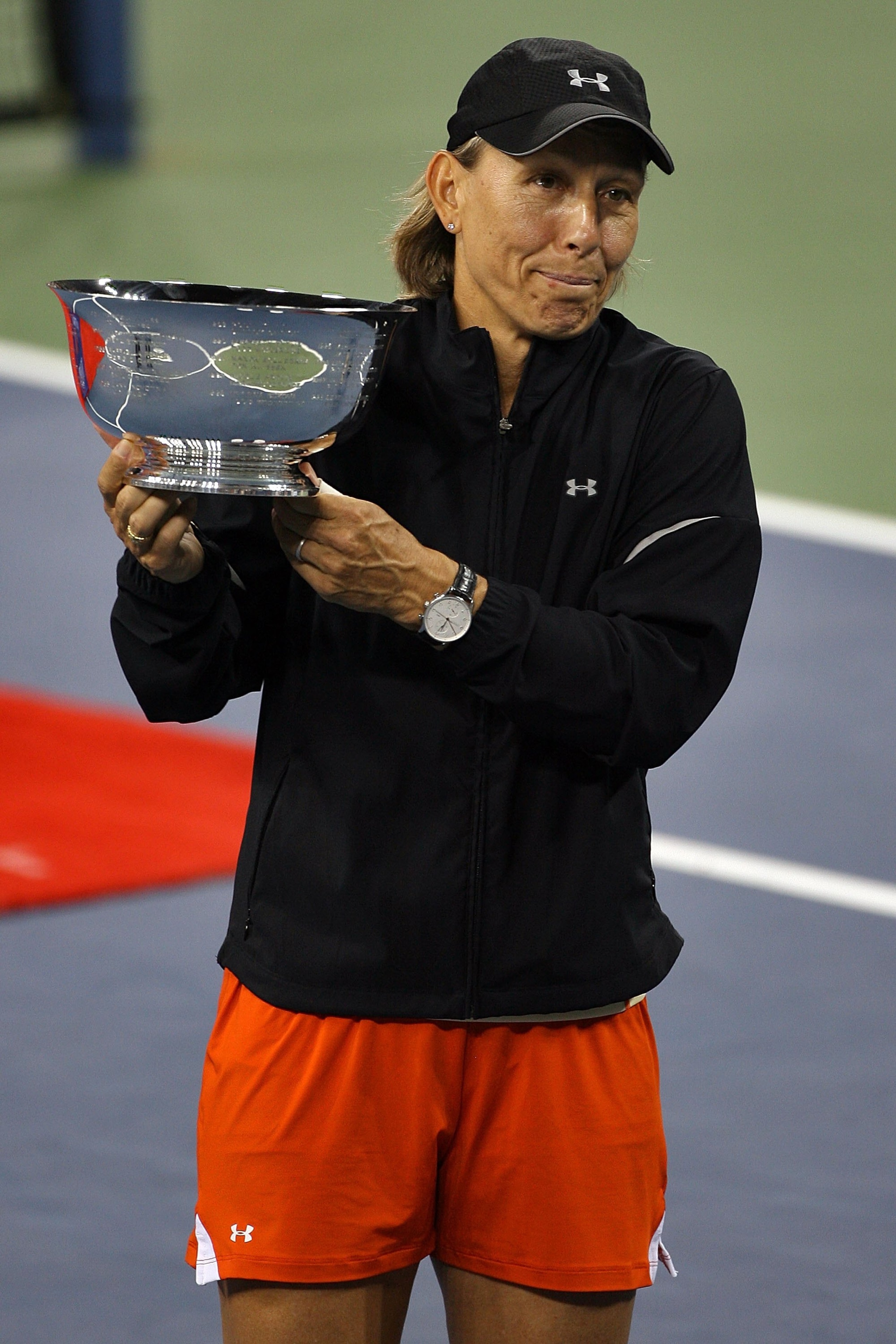NEW YORK - SEPTEMBER 09: Martina Navratilova holds the trophy after her and Bob Bryan defeated Kveta Peschke and Martin Damm of the Czech Republic to win the mixed doubles final during the U.S. Open at the USTA Billie Jean King National Tennis Center in NEW YORK - SEPTEMBER 09: Martina Navratilova holds the trophy after her and Bob Bryan defeated Kveta Peschke and Martin Damm of the Czech Republic to win the mixed doubles final during the U.S. Open at the USTA Billie Jean King National Tennis Center in