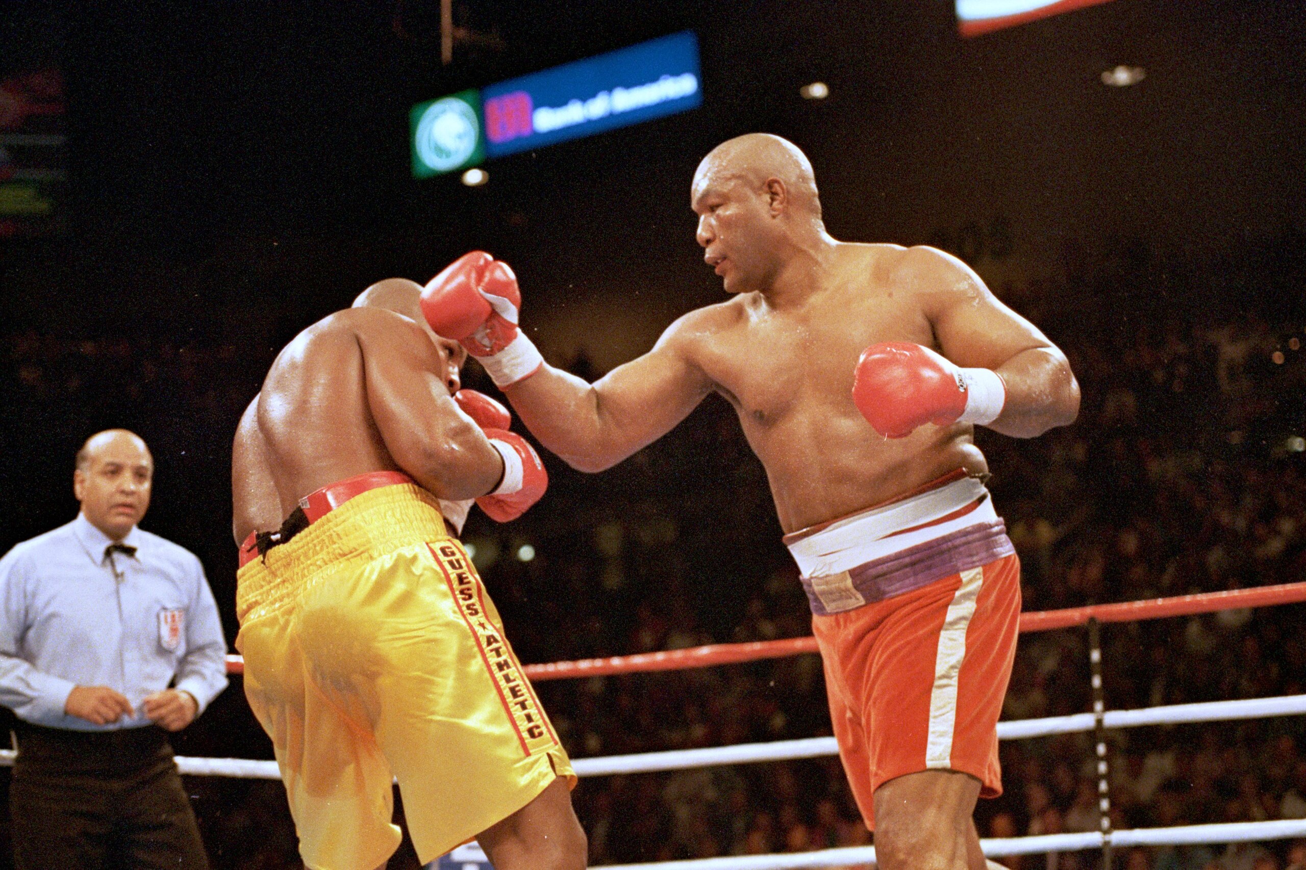5 Nov 1995: George Foreman trows a left punch at Michael Moorer during the fight in Las Vegas. Forman wins by a knock out in round 10. Mandatory Credit: Al Bello /Allsport 5 Nov 1995: George Foreman trows a left punch at Michael Moorer during the fight in Las Vegas. Forman wins by a knock out in round 10. Mandatory Credit: Al Bello /Allsport