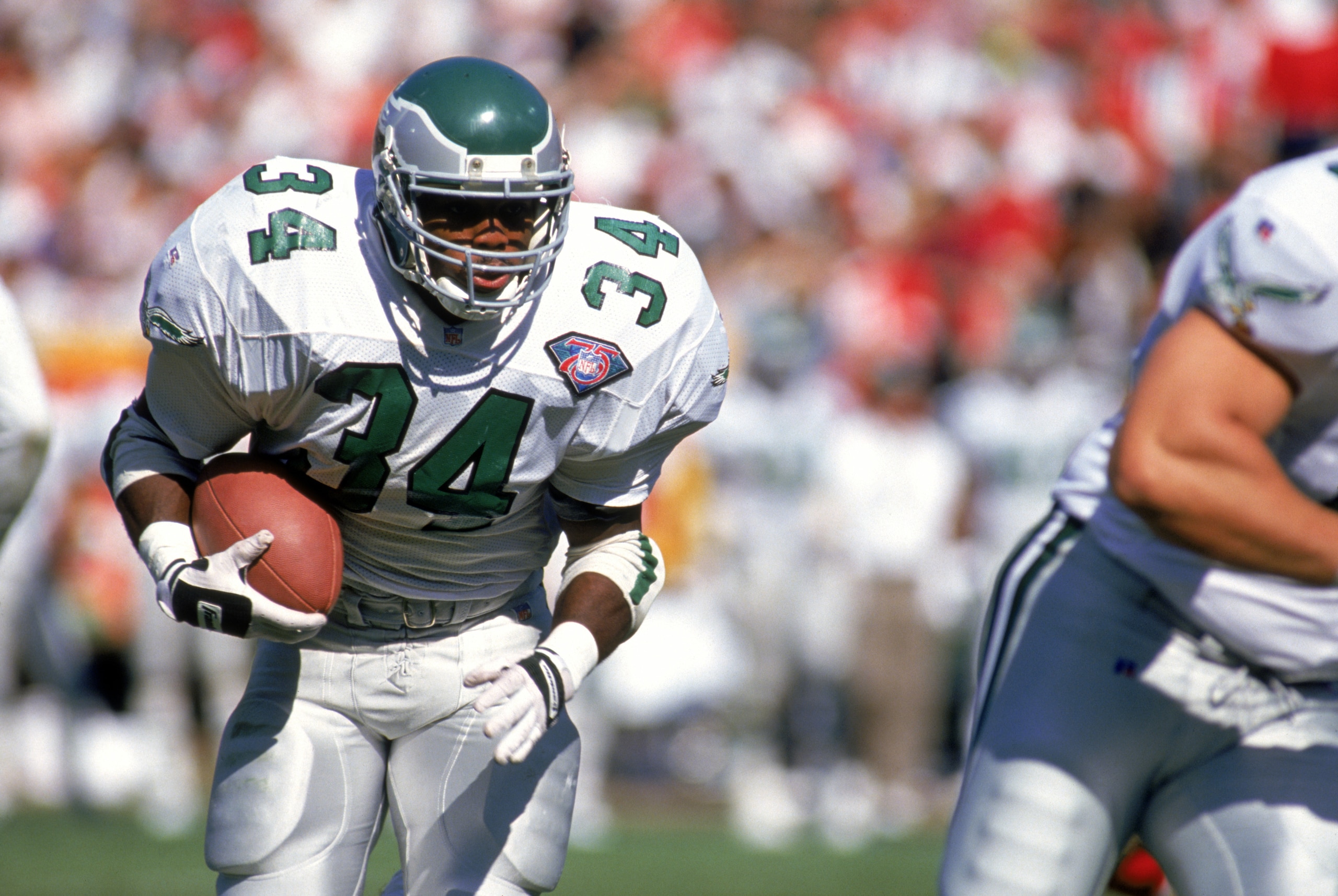 SAN FRANCISCO - OCTOBER 2:  Running back Herschel Walker #34 of the Philadelphia Eagles rushes for yards during a game against the San Francisco 49ers at Candlestick Park on October 2, 1994 in San Francisco, California.  The Eagles won 40-8.  (Photo by Ge