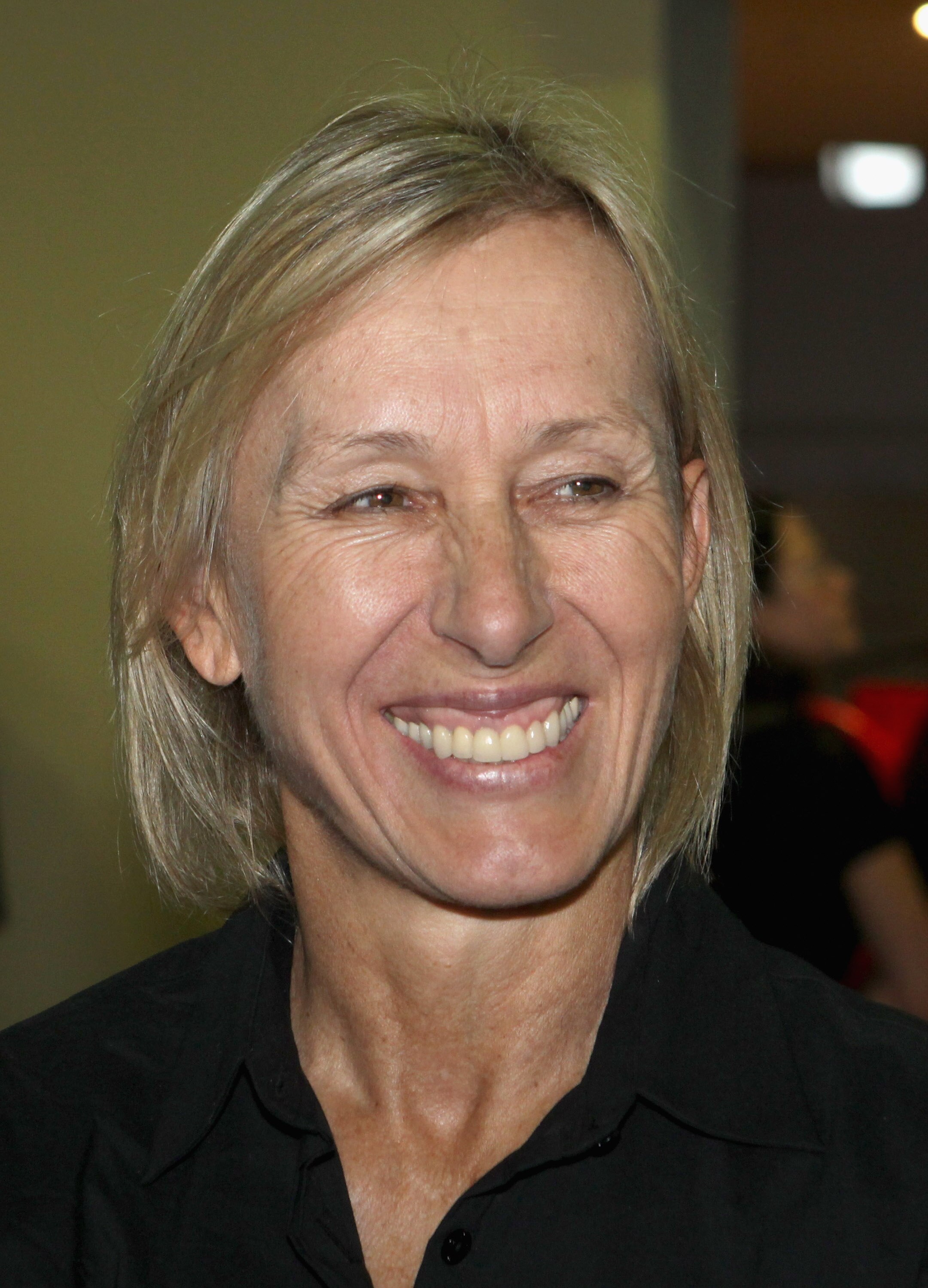 NAIROBI, KENYA - DECEMBER 13:  Martina Navratilova smiles at Nairobi Airport on the return travel day of the Martina Navratilova Mt. Kilimanjaro Climb on December 13, 2010 in Nairobi, Kenya. Martina Navratilova was taken off Kilimanjaro after suffering fr