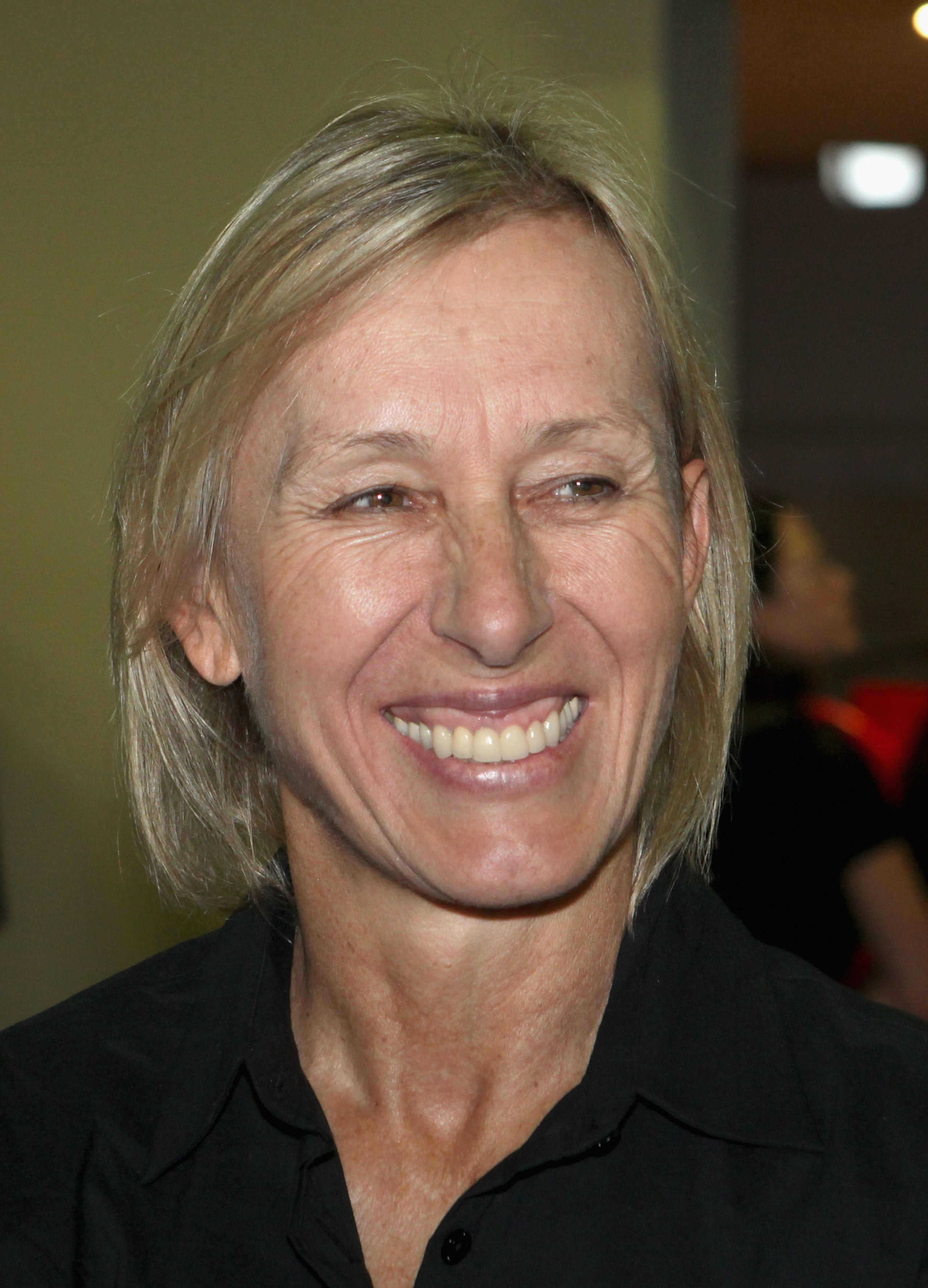 NAIROBI, KENYA - DECEMBER 13:  Martina Navratilova smiles at Nairobi Airport on the return travel day of the Martina Navratilova Mt. Kilimanjaro Climb on December 13, 2010 in Nairobi, Kenya. Martina Navratilova was taken off Kilimanjaro after suffering fr